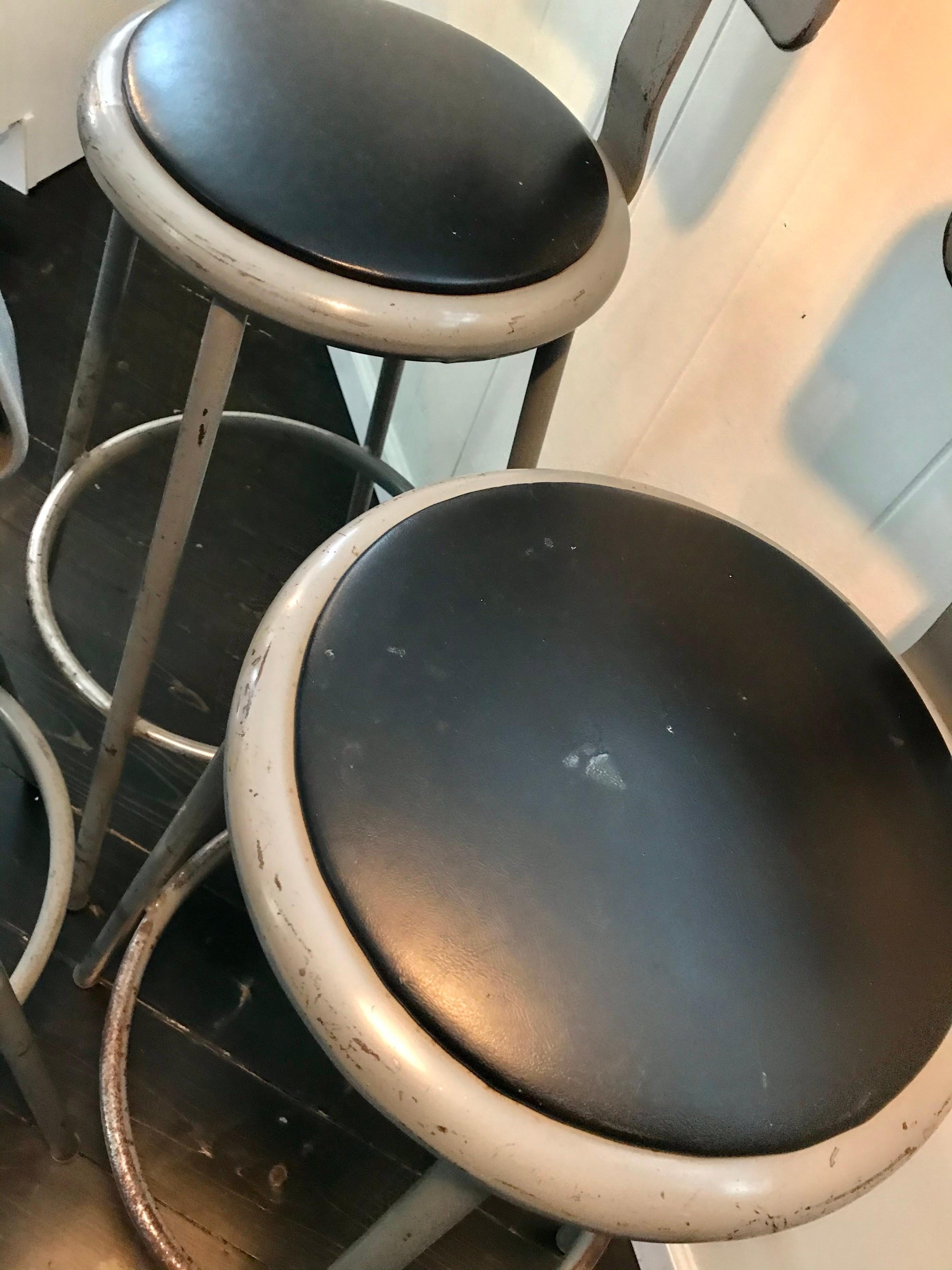 American Set of Three Mid Century Industrial Metal Bar Stools with Backrests