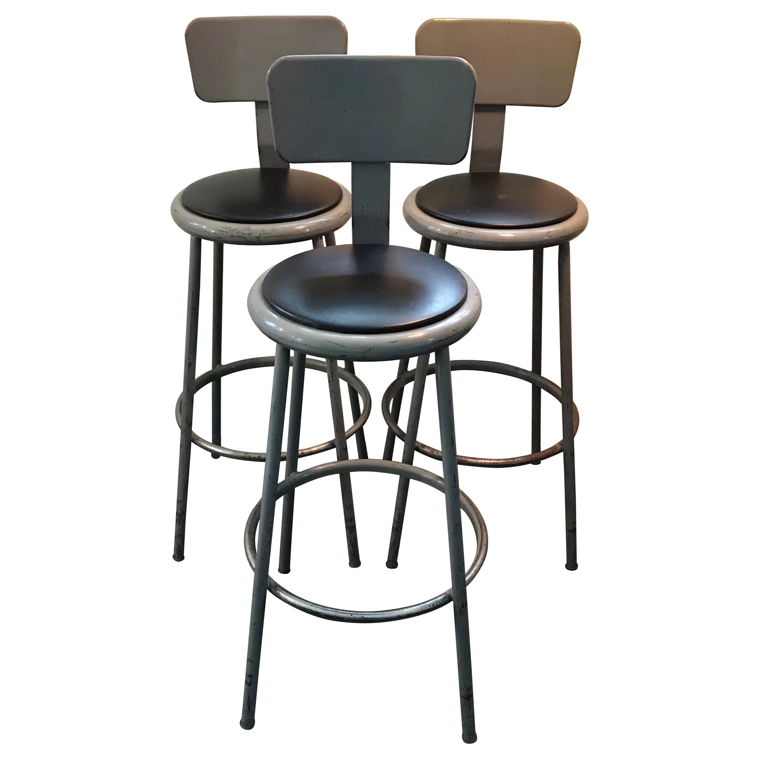 Set of Three Mid Century Industrial Metal Bar Stools with Backrests