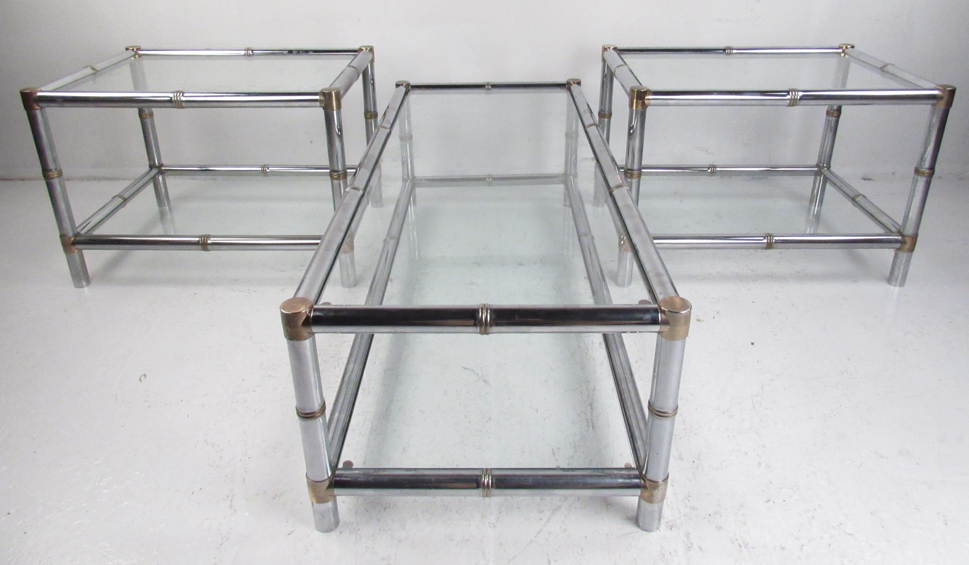 Vintage set of two end tables and long coffee table with heavy chrome faux bamboo frames and glass shelves. Pair of end tables are 28.25