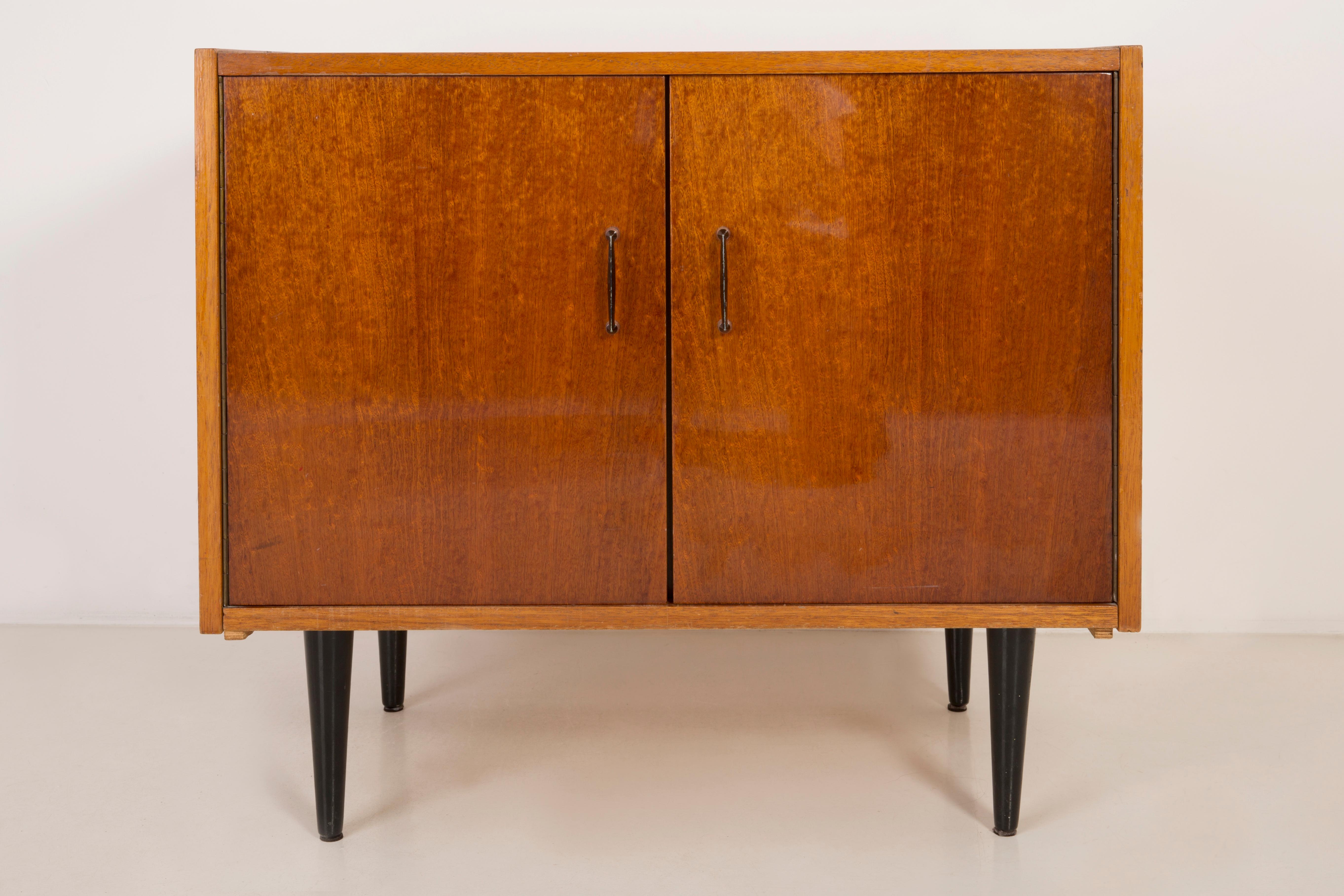 TV side table/sideboard from the 1960s. It was manufactured in Poland. The table was made of wood, it was refreshed. Very good original vintage condition.