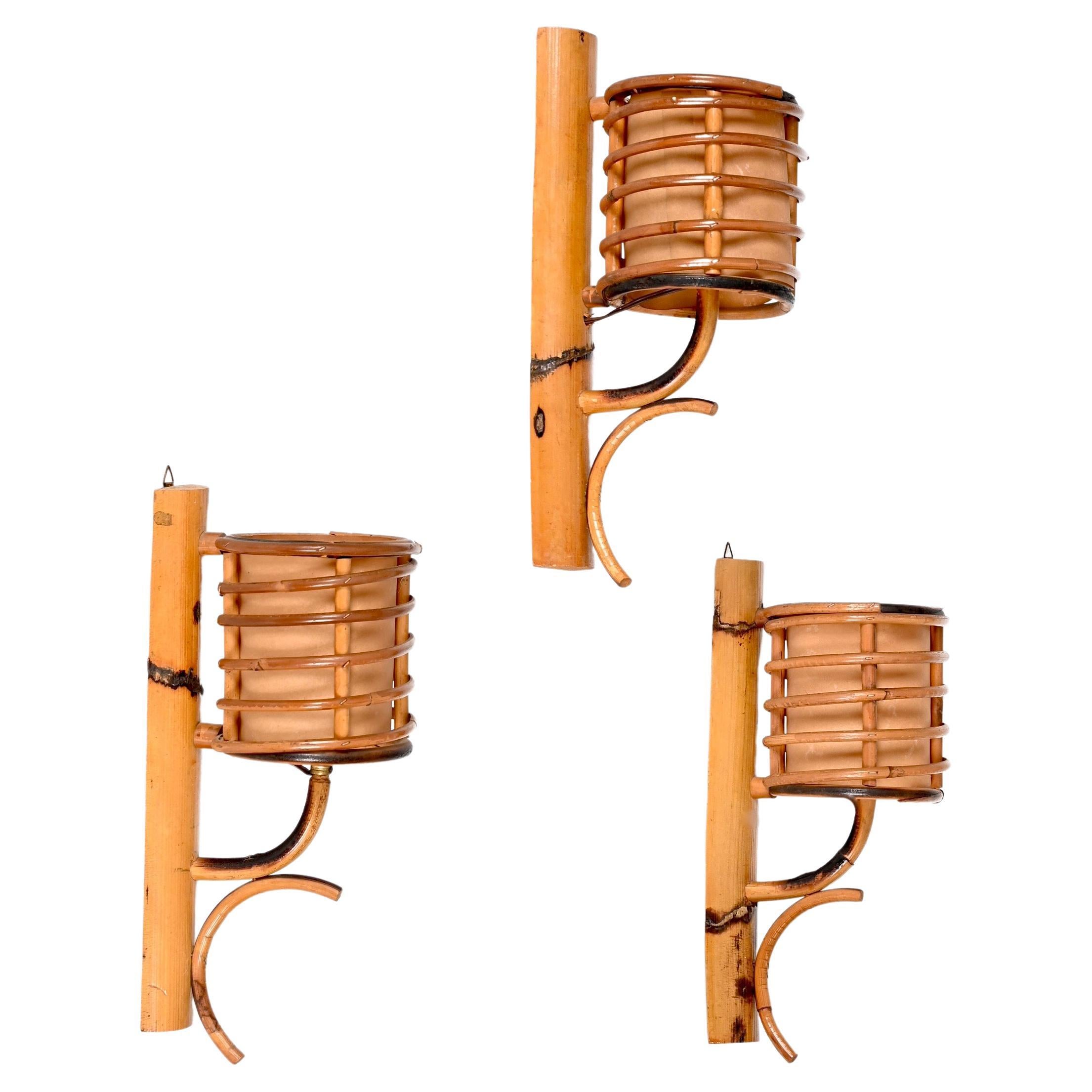 Set of Three Mid-Century Rattan "Lantern" Sconces Attributed Louis Sognot, 1960s
