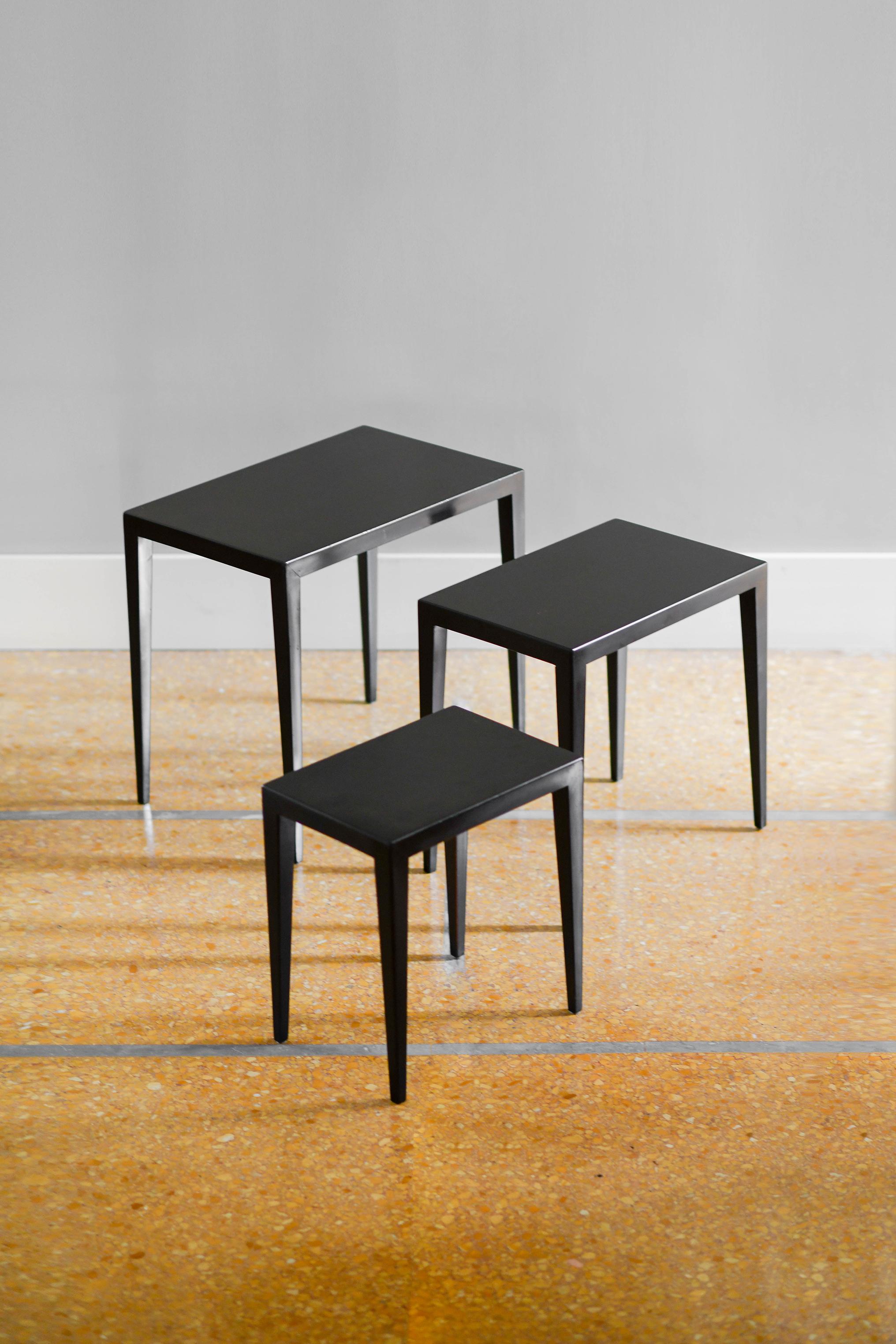 Set of three midcentury side tables by IIllums Bolighus Kobenhavn made in black lacquered wood.
Product details
Stacked tables dimensions: 56w x 50h x 35d cm
Materials: wood.
Production: Scandinavian production 1950-1960.