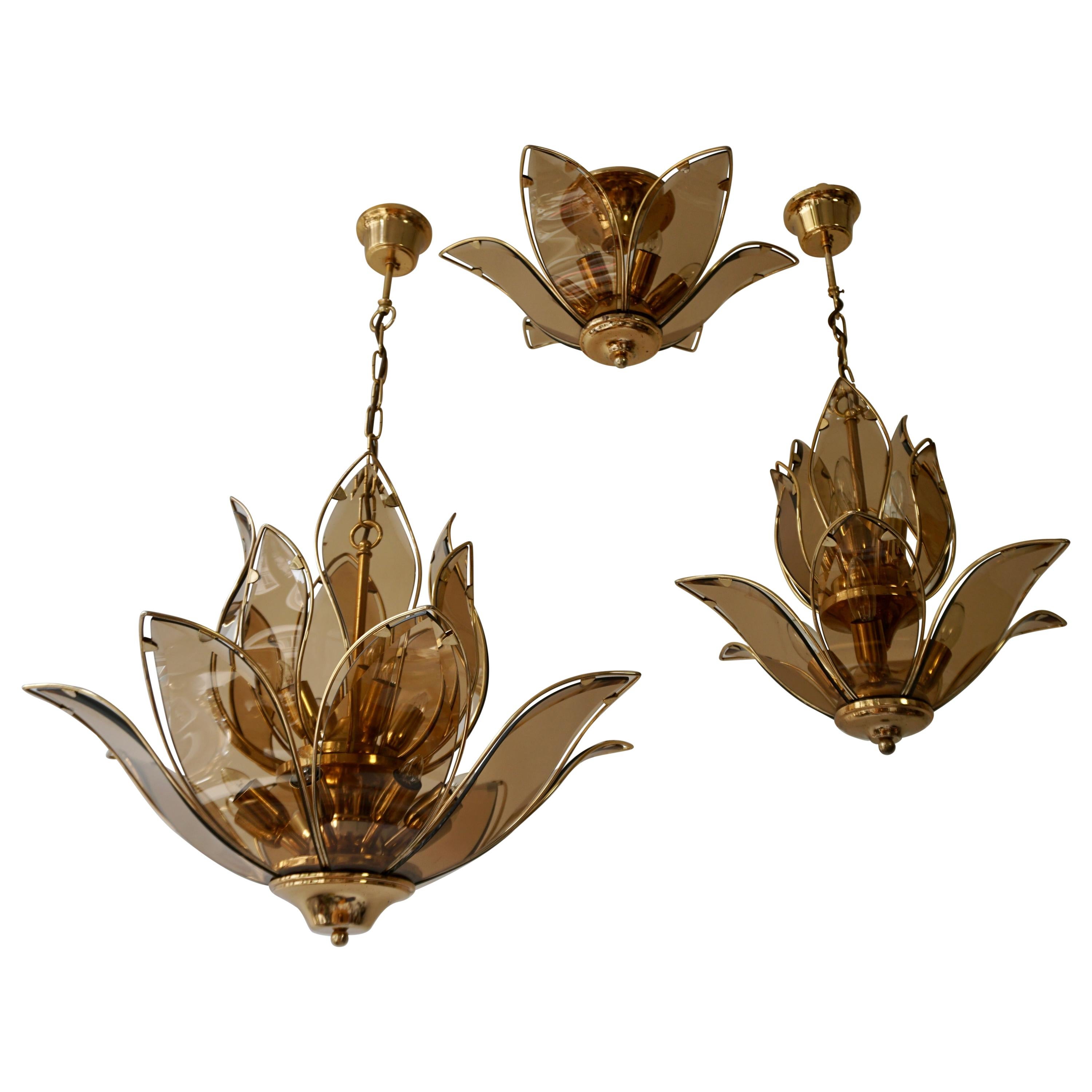 Set of Three Midcentury Chandeliers in Brass and Glass