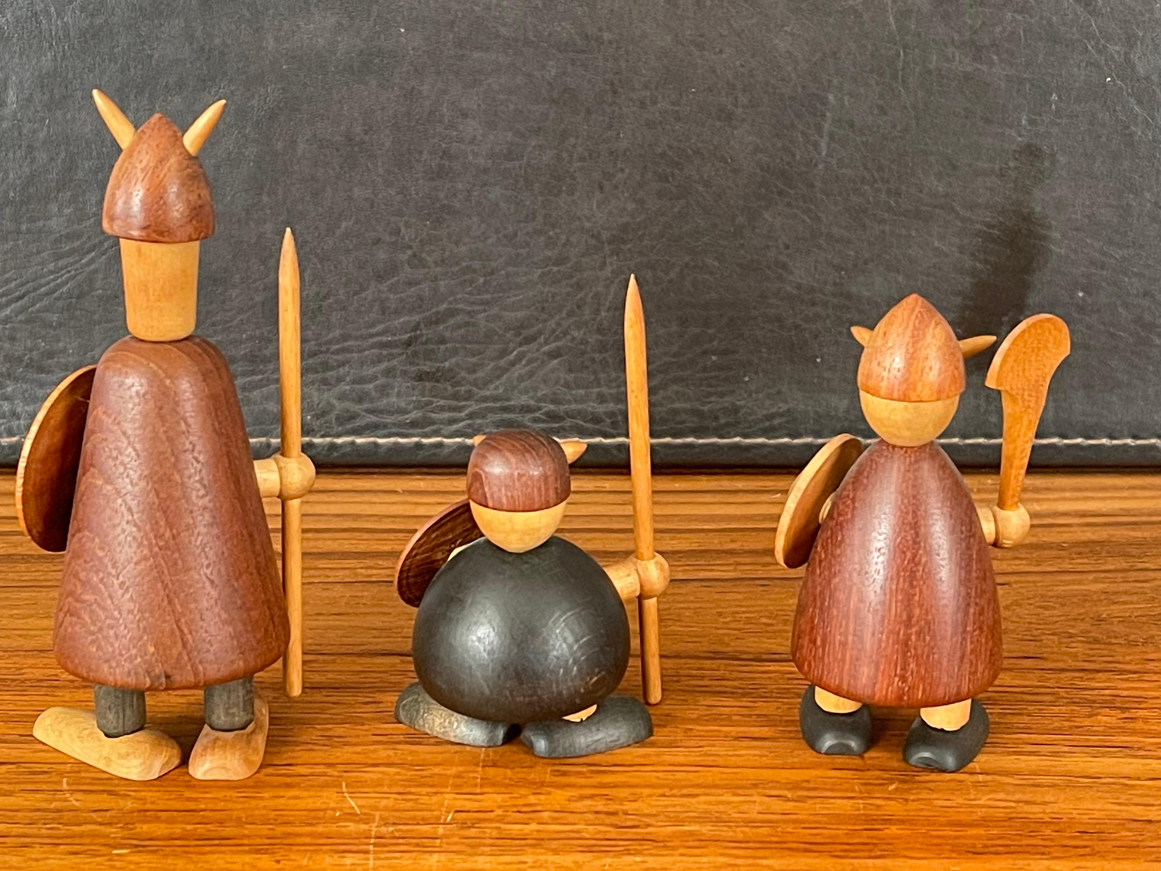 wooden viking figures