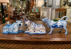 Set of Three Midcentury Dutch Blue and White Hand Painted Porcelain Cow Figures