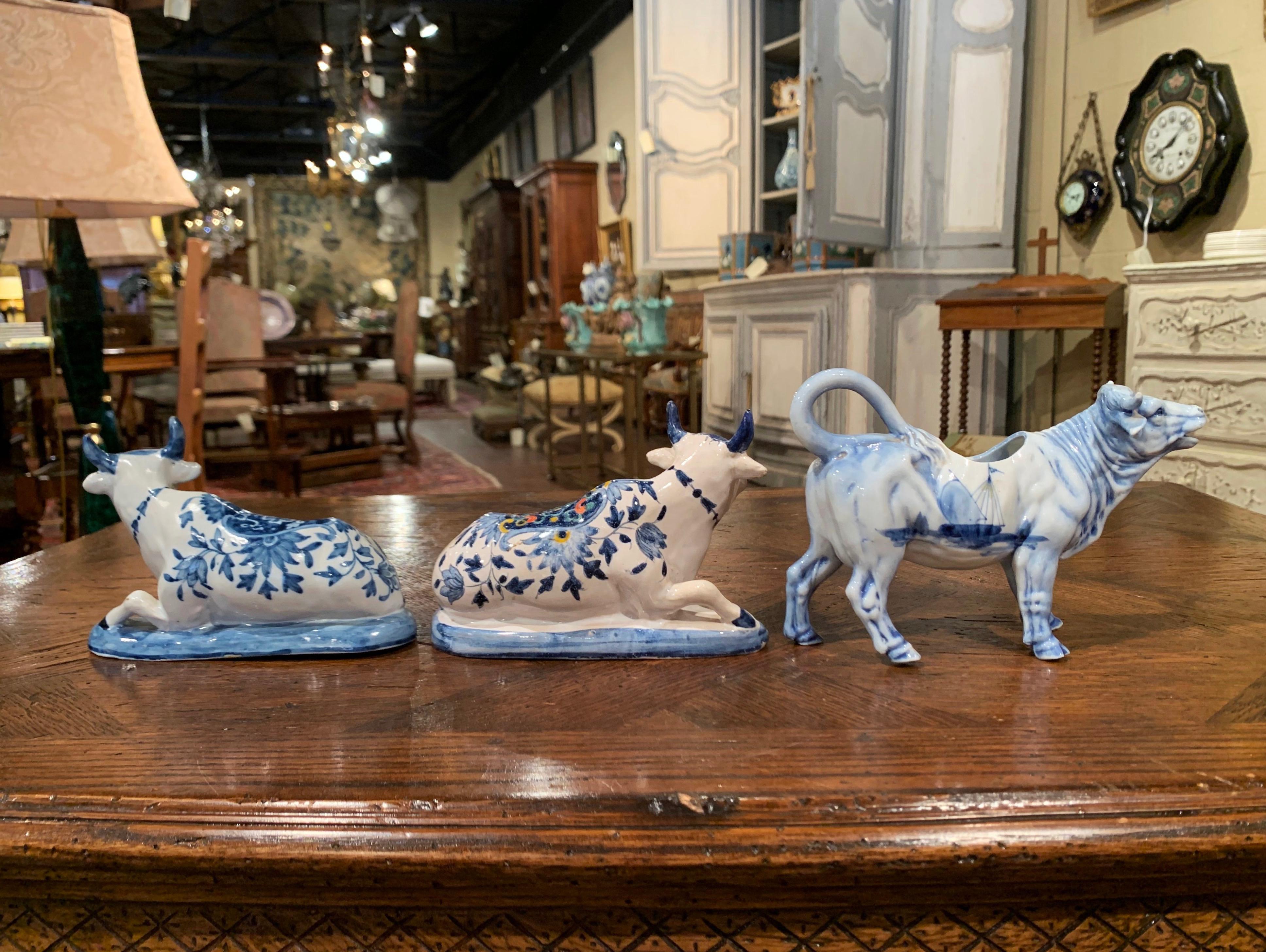 Set of Three Midcentury Dutch Blue and White Hand Painted Porcelain Cow Figures In Excellent Condition For Sale In Dallas, TX