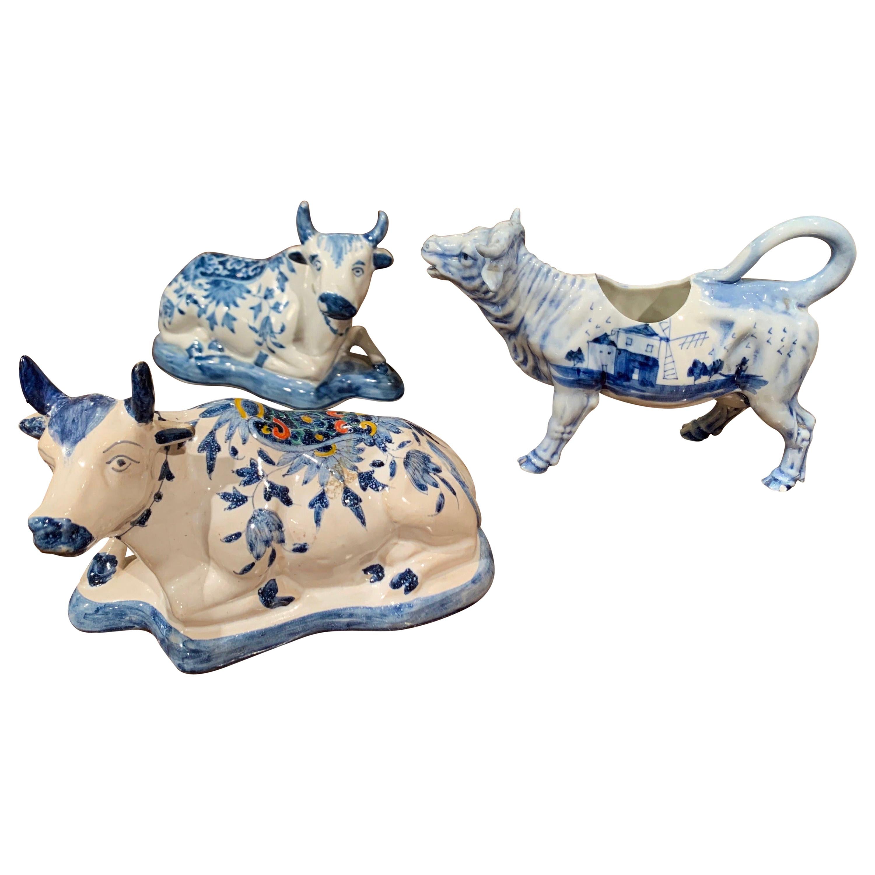 Set of Three Midcentury Dutch Blue and White Hand Painted Porcelain Cow Figures