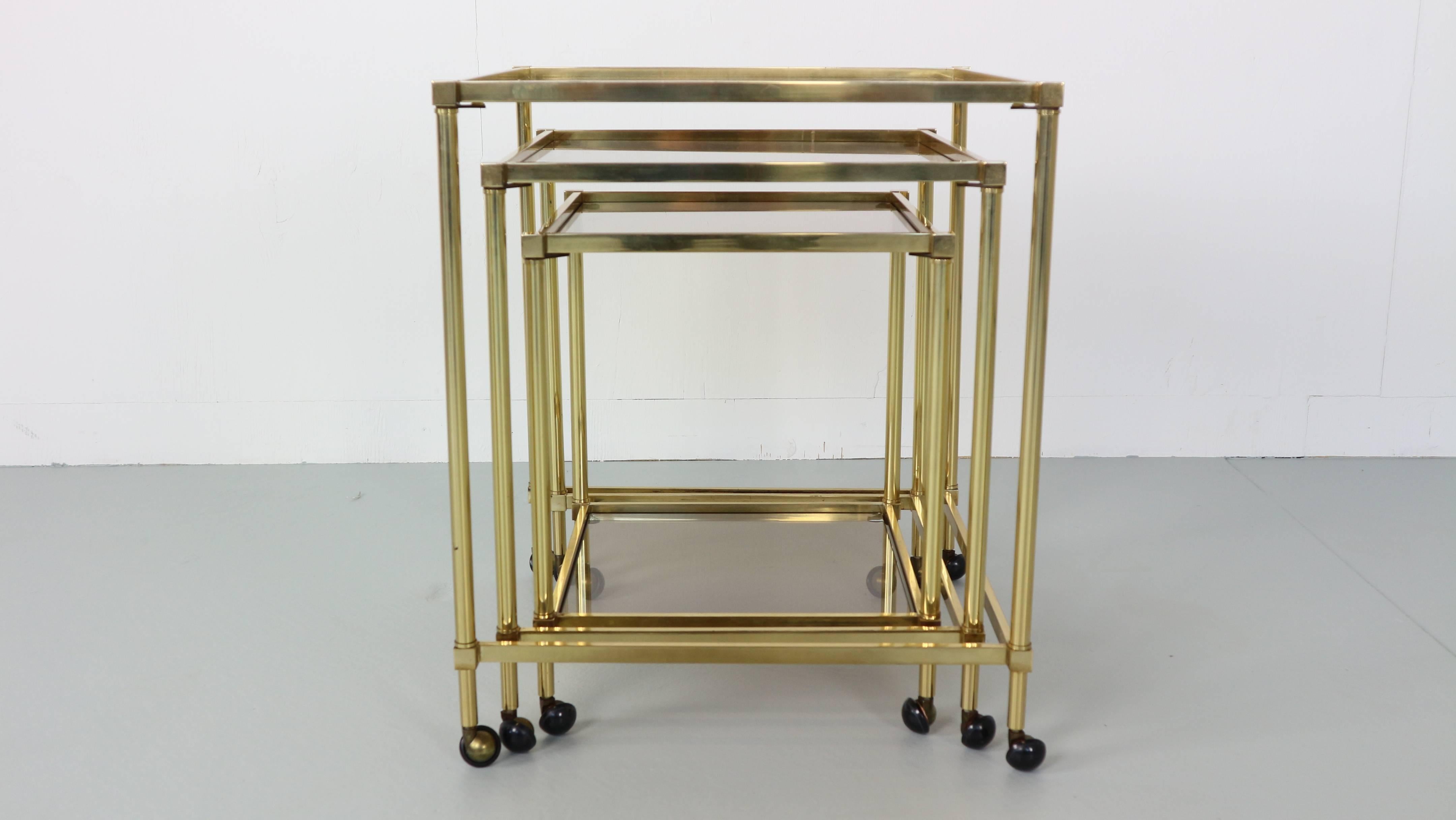 Set of Three Midcentury French Brass Nesting Tables with Glass Top In Good Condition In The Hague, NL