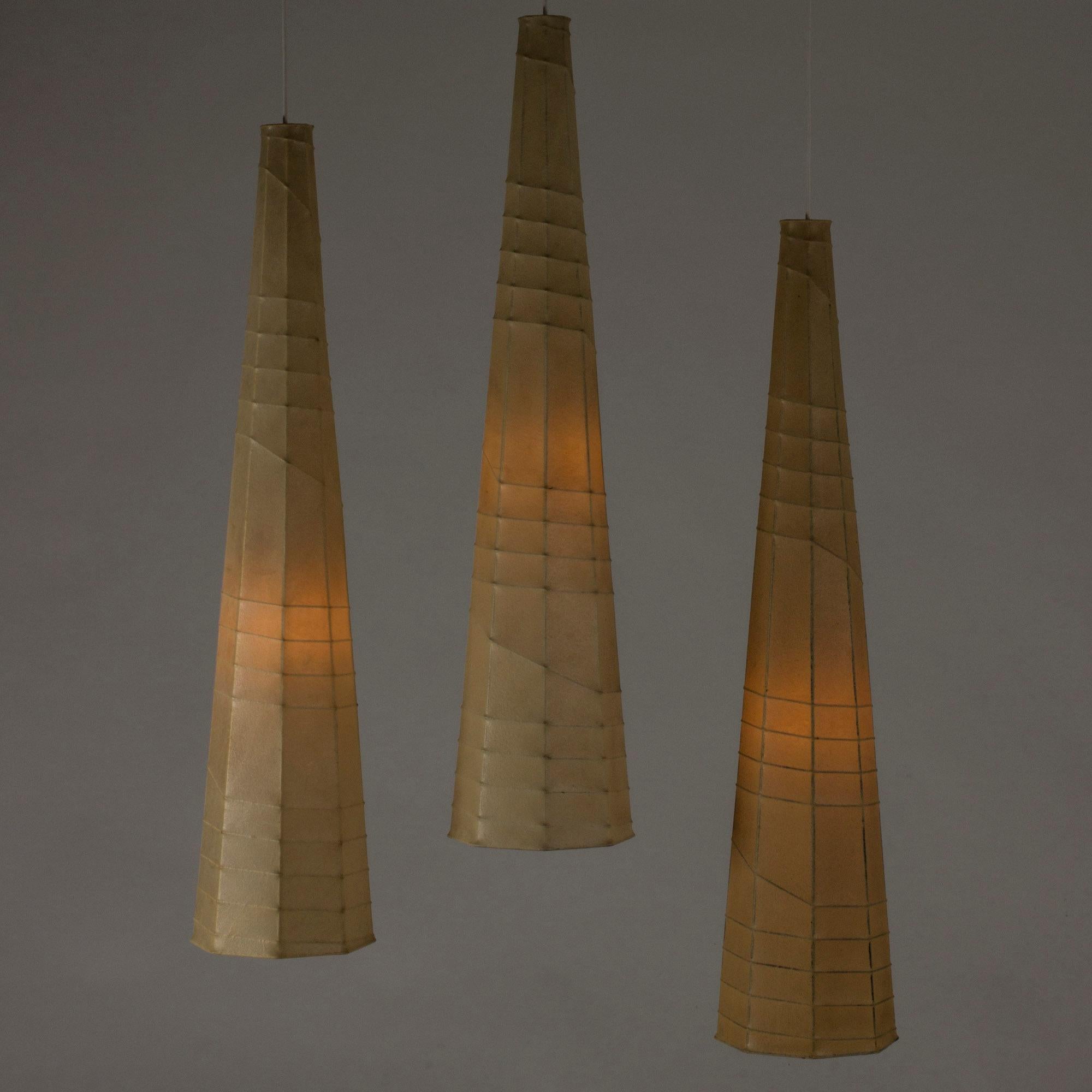 Set of three metal and resin ceiling lights by Hans Bergström, where the resin has been sprayed onto the frames of the shades. Cool, elongated and angular shades where the pattern of the metal frames show through the material. Look amazing when lit,