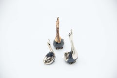 Set of three miniature silver swans