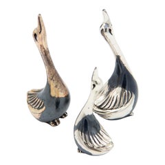 Set of three miniature silver swans