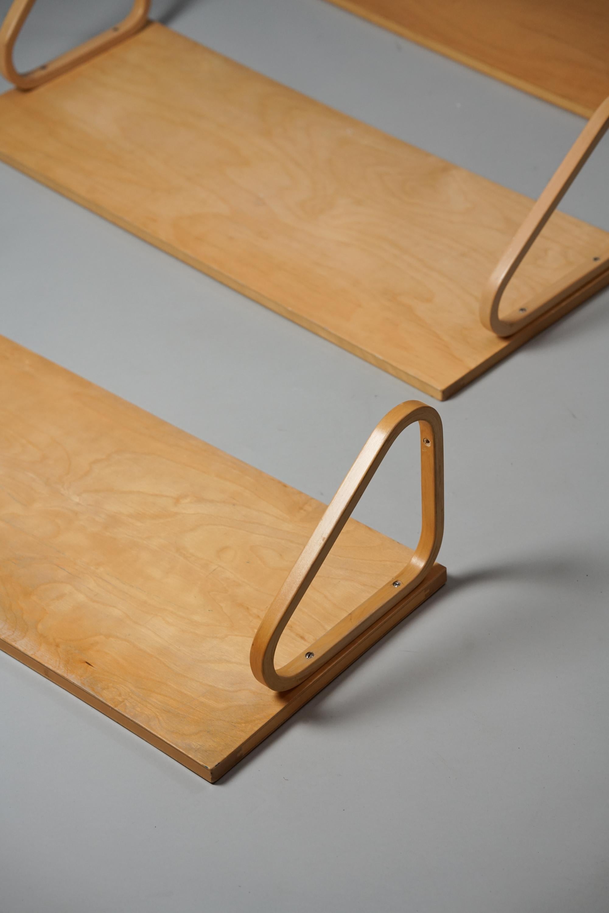 Set of three model 112A shelves, designed by Alvar Aalto, manufactured by Artek, 1960s. Birch. Good vintage condition, minor patina consistent with age and use. The shelves are sold as a set. 

Alvar Aalto (1898-1976) is probably the most famous