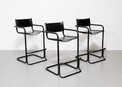 Set of Three Modernist Black Tubular and Leather Bar Stools
