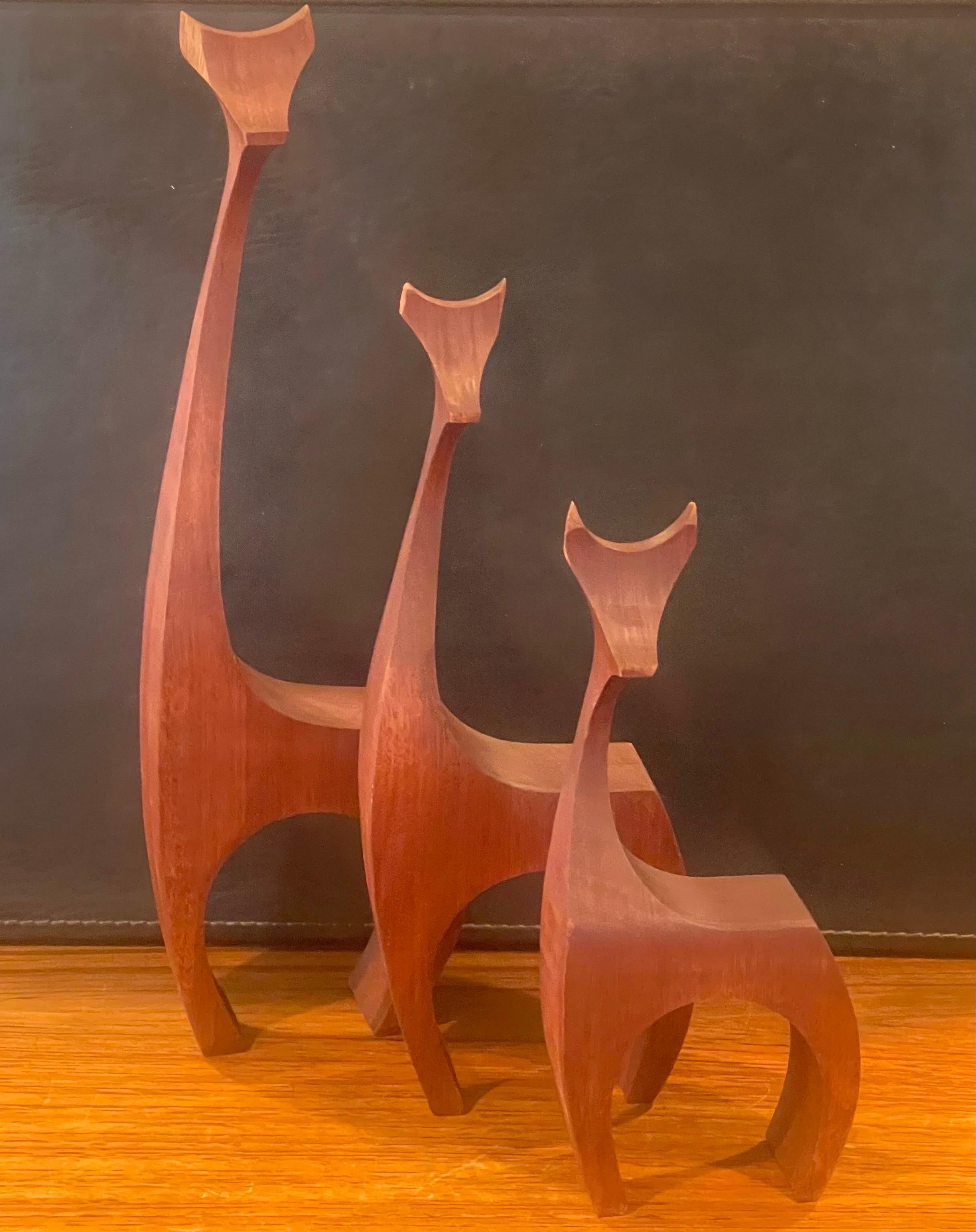Hand-Carved Set of Three Modernist Giraffe Wood Sculptures by Del Zotto Studios For Sale
