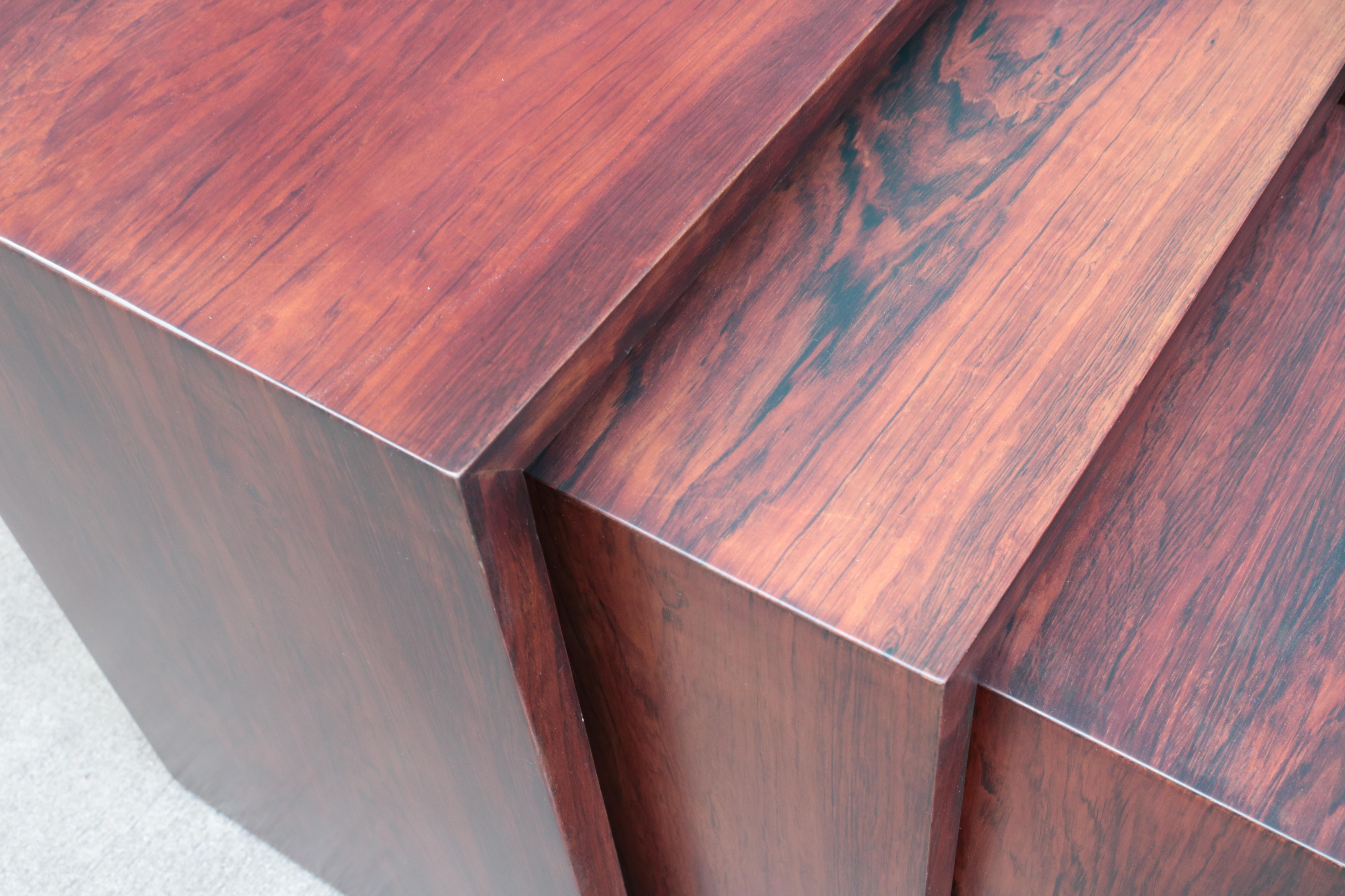 A set of three Modernist Nesting Tables.
Rosewood.
      