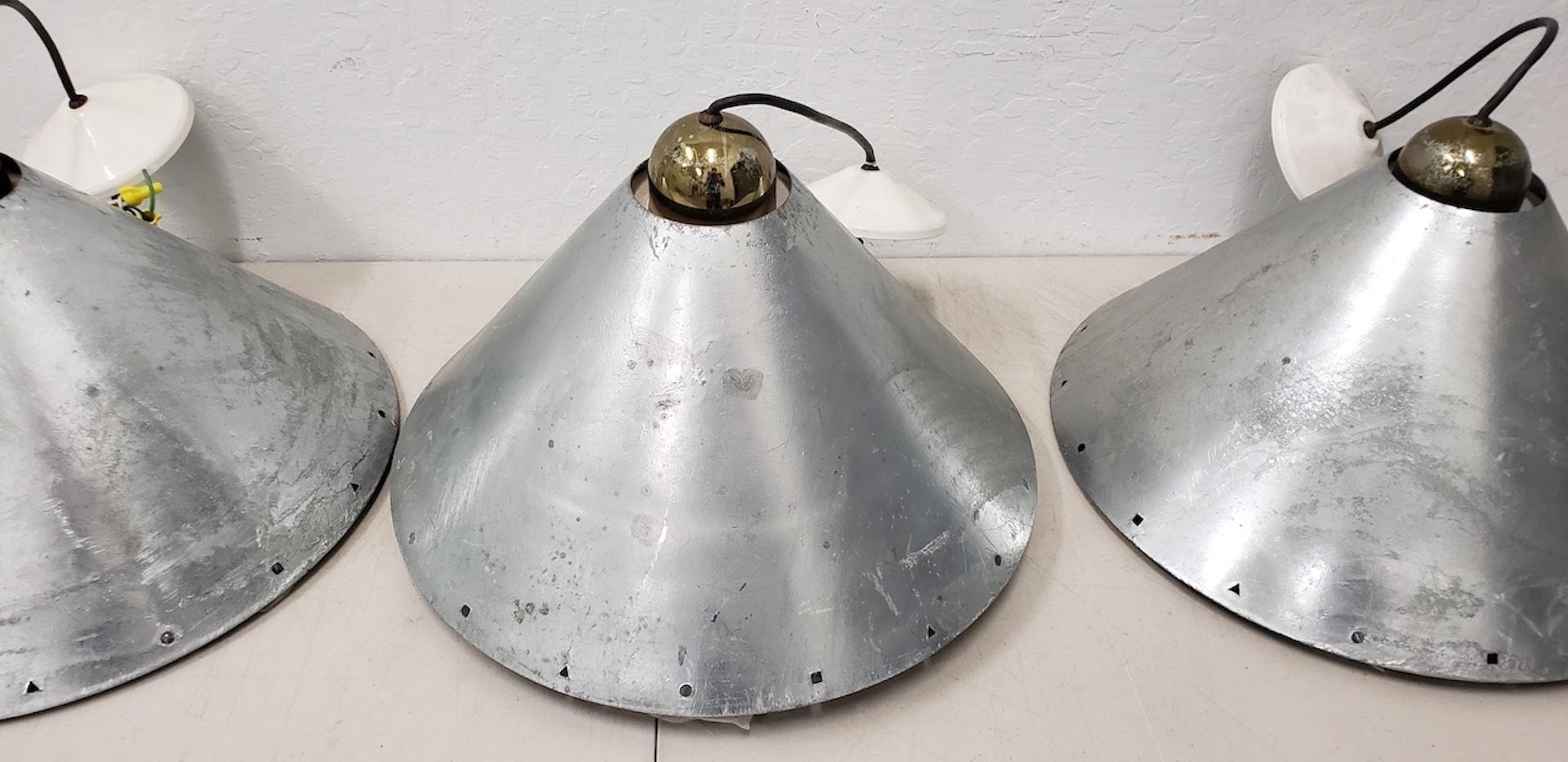 Industrial Set of Three Modernist Steel and Zinc Hanging Lamps by Ron Rezek circa 1980