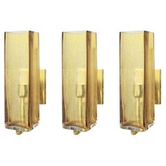 Set of Three Murano Amber Glass & Brass Sconces, Italy, 1980's.