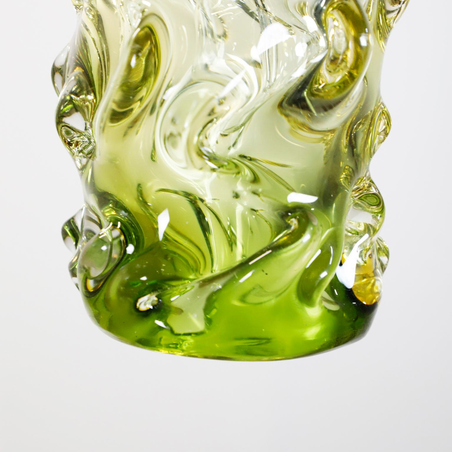 Circa 1970. We offer this Set of Three Murano Pendant Lights.