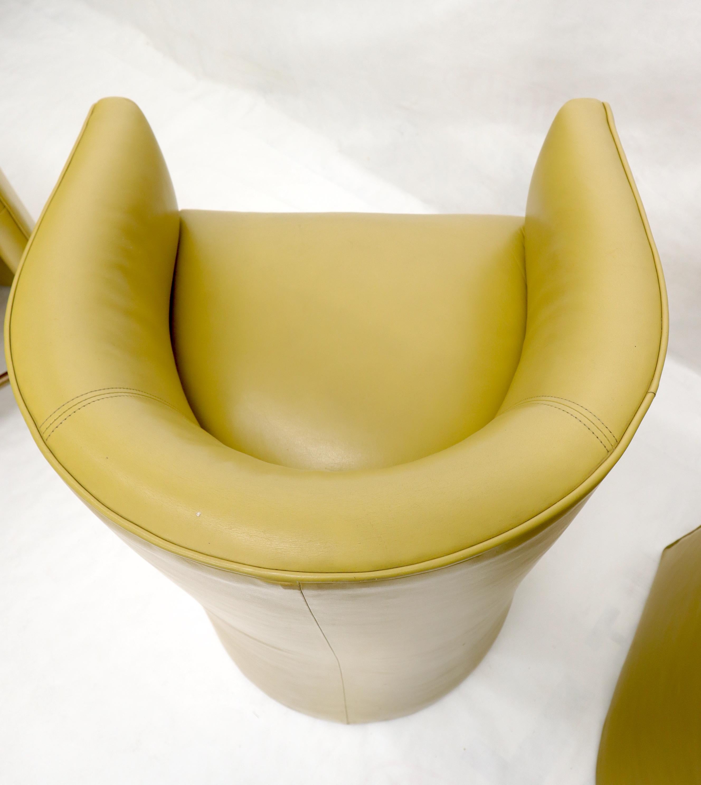 Set of 3 Mid-Century Modern mustard leather possibly Italian barrel back bar stools.