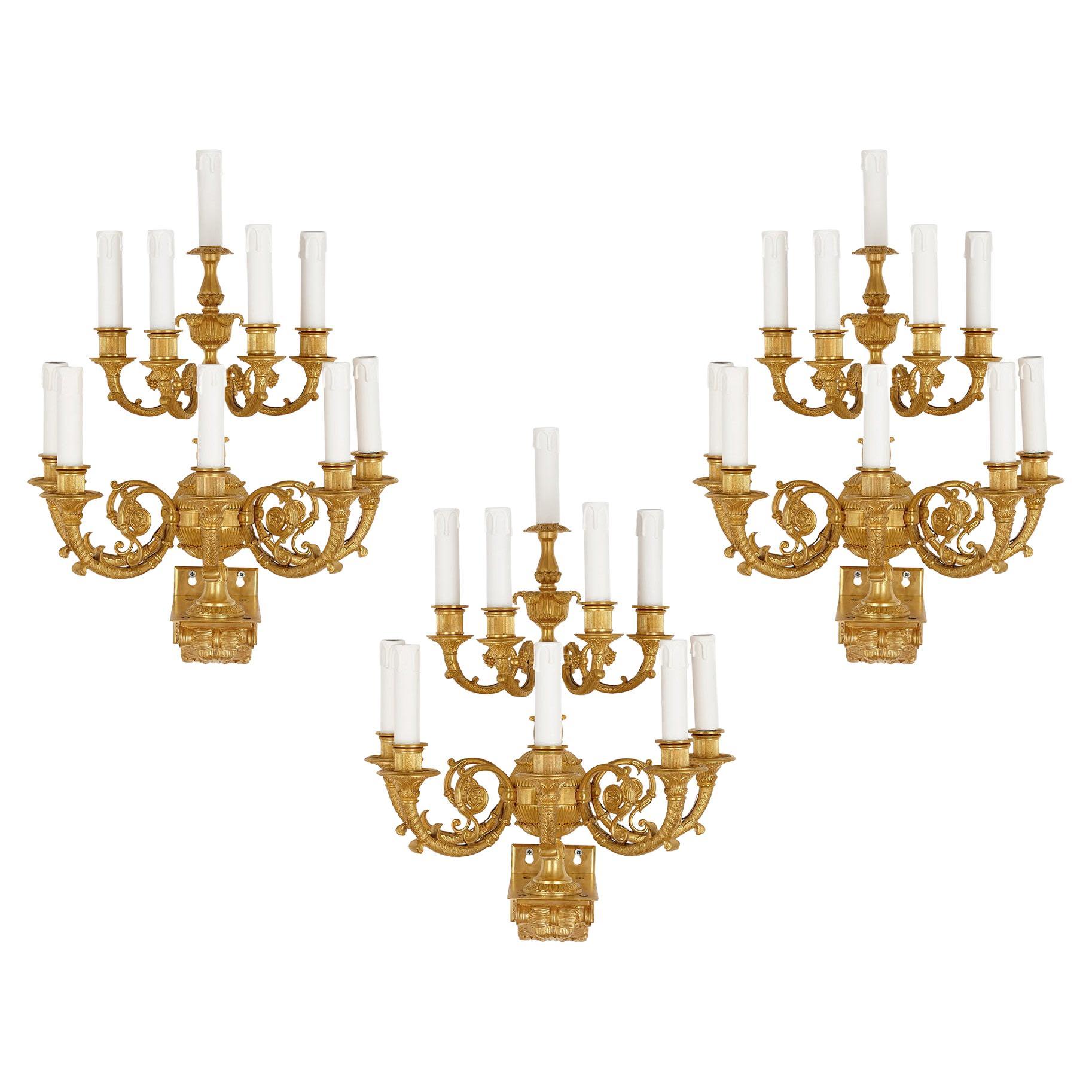 Set of Three Neoclassical Gilt Bronze Wall Lights For Sale