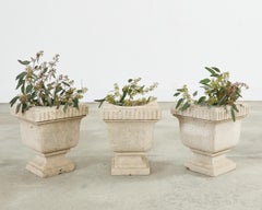 Set of Three Neoclassical Style Carved Stone Urn Planters