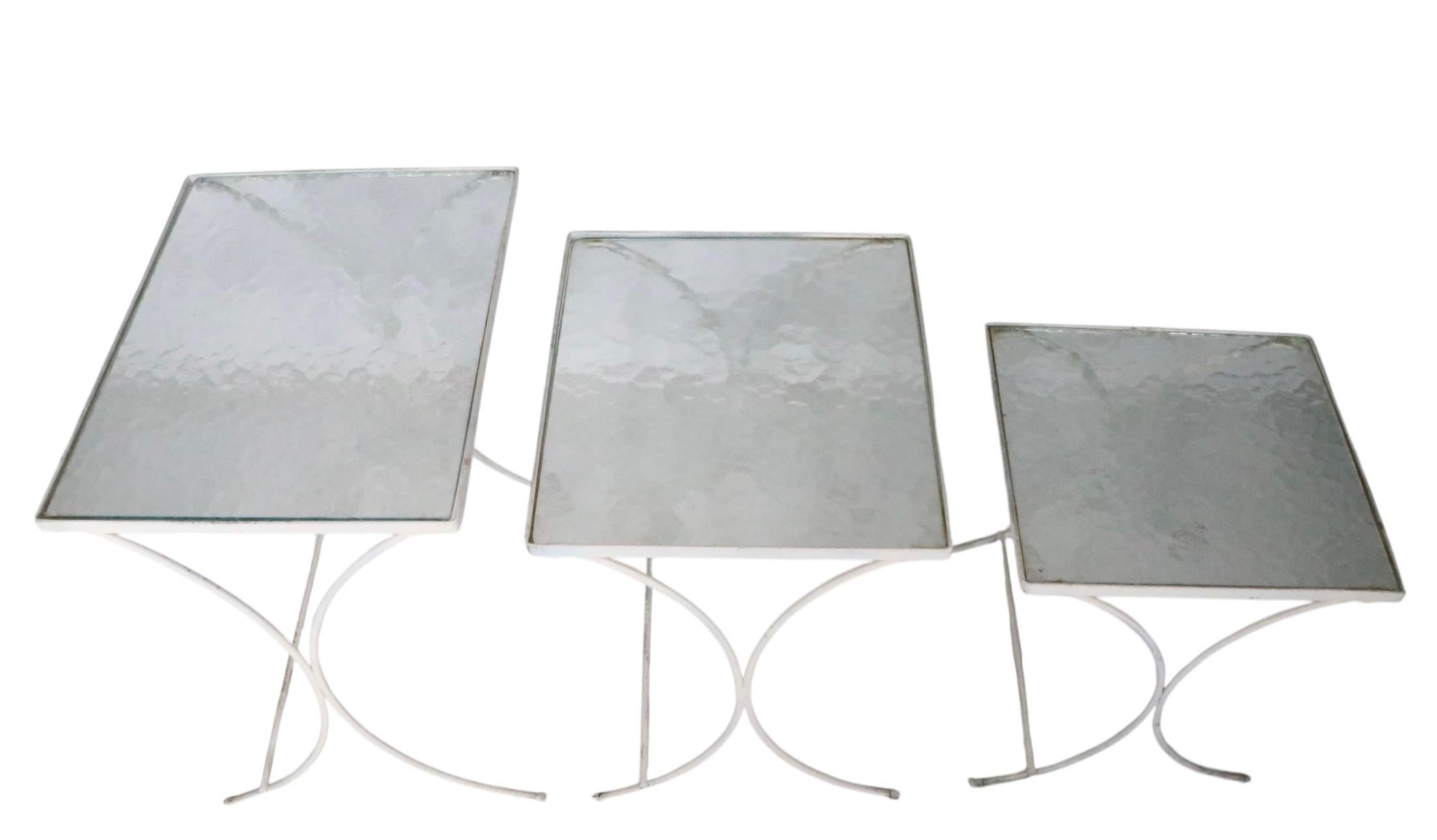 Set of Three Nesting Garden Patio Poolside Wrought Iron Textured Glass Tables In Good Condition For Sale In New York, NY