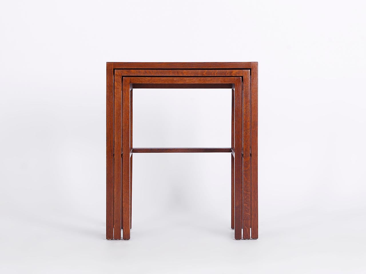 A set of three nesting tables, model no. 50, designed by Jindrich Halabala for UP Zavody, Brno in the 1930s. Dark stained and laquered beech, dark brown Bakelite tops measures: 
Measures: height: 65, 62, 60 cm
width: 55, 49, 43cm
depth: 40, 38,
