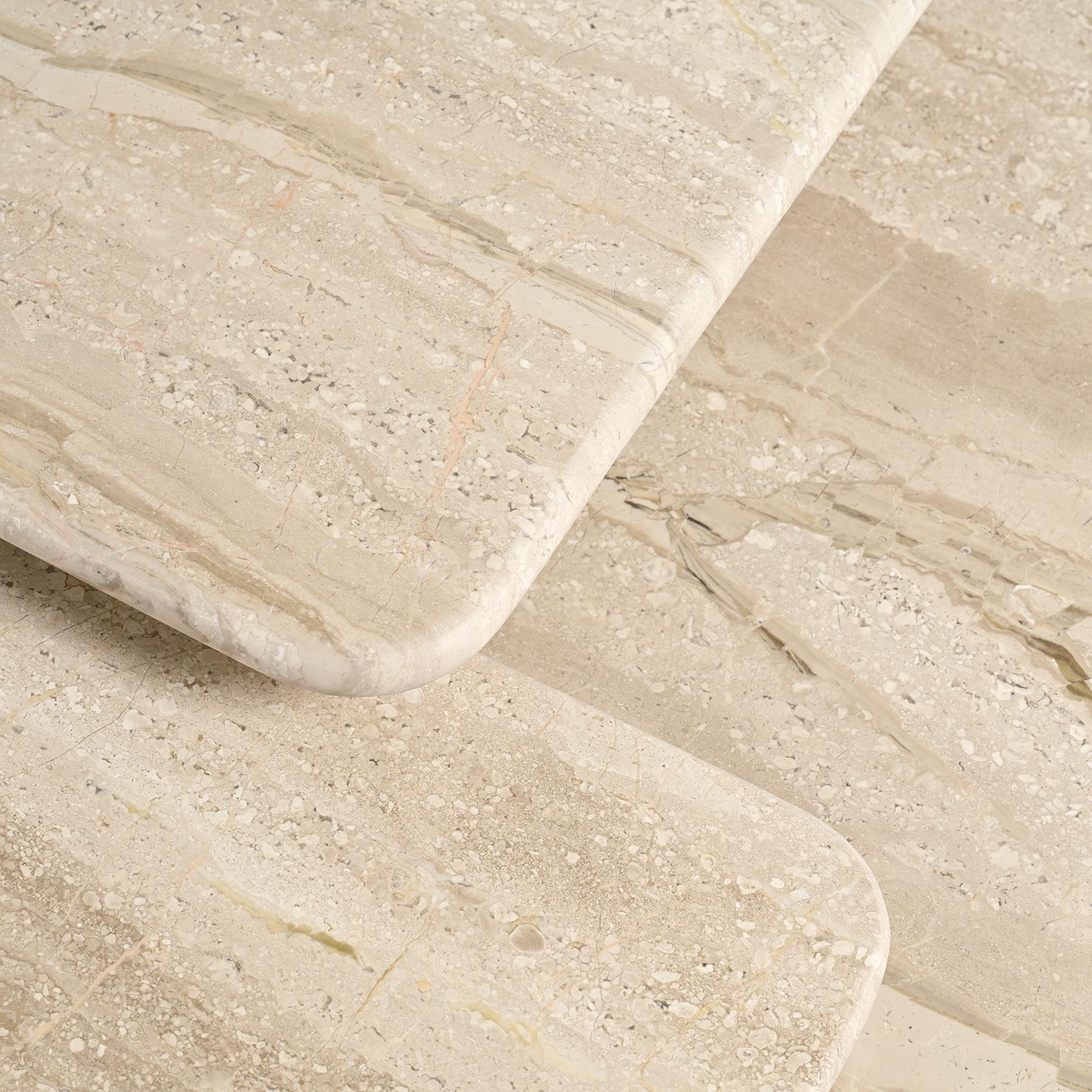 Late 20th Century Set of three nesting travertine tables, Italy circa 1970