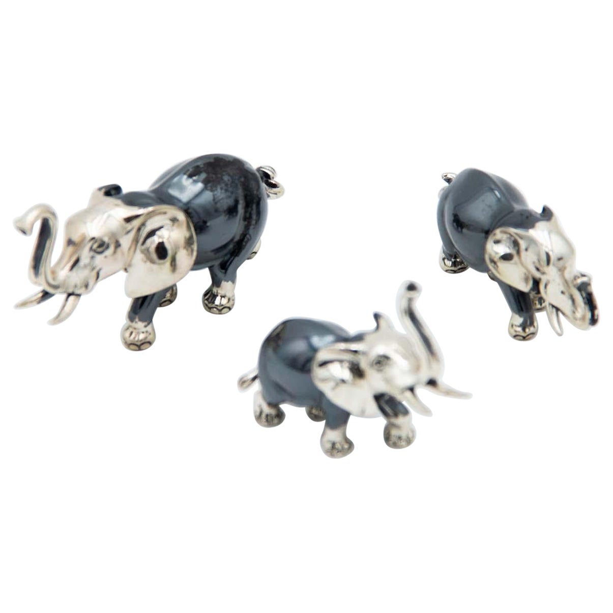Set of three nickel silver elephants For Sale