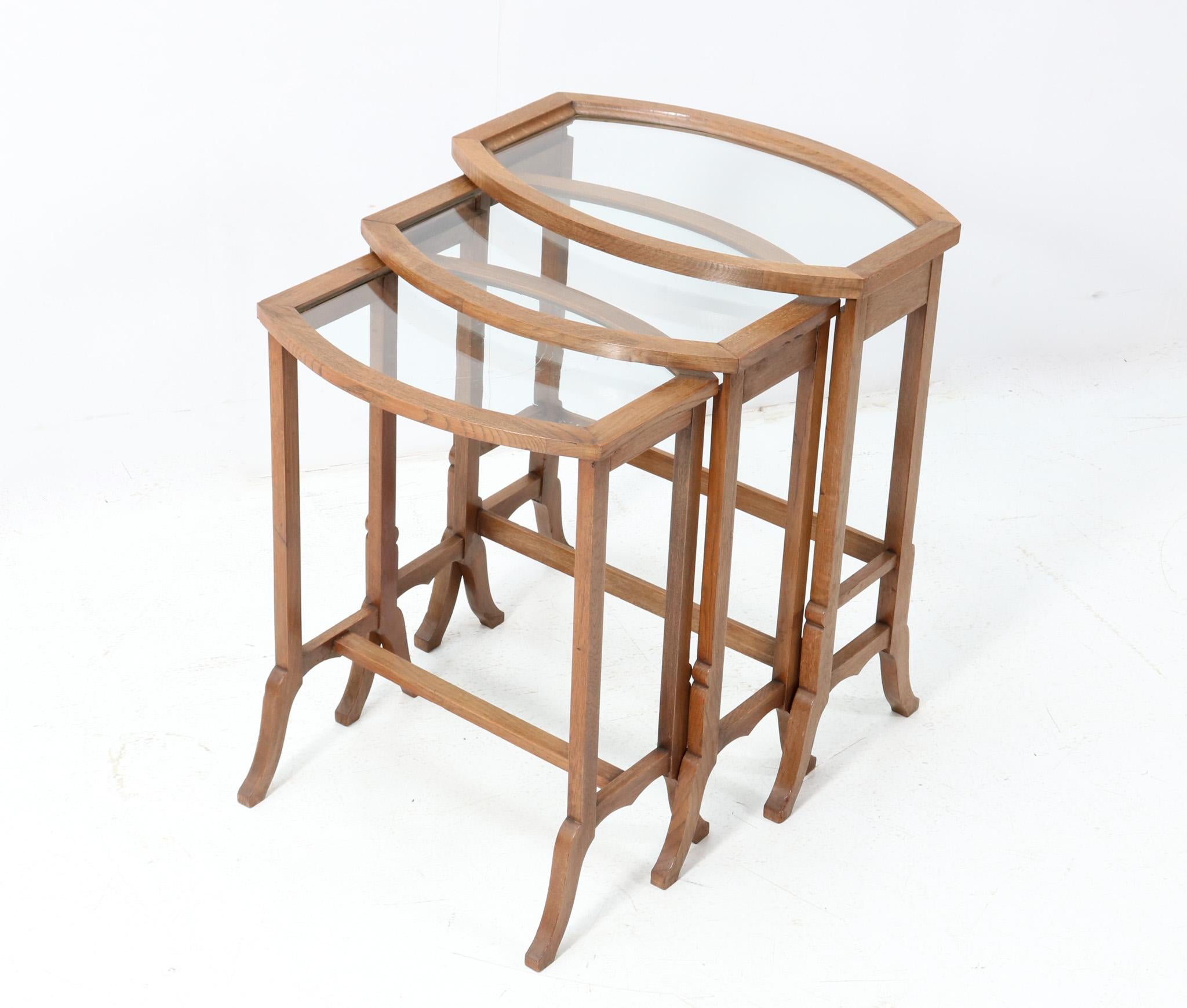 Dutch Set of Three Oak Art Nouveau Nesting Tables with Glass Tops For Sale