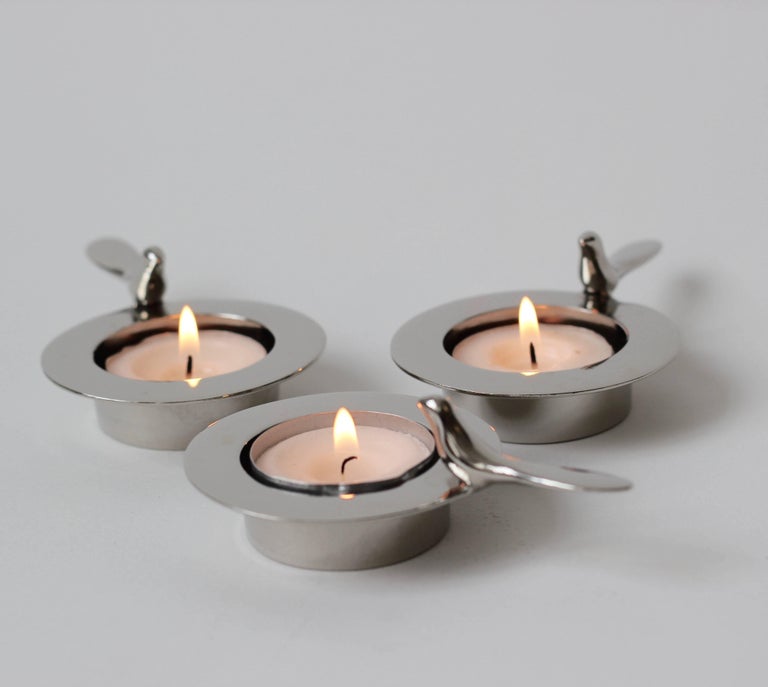 Each of those original and elegant brass tea light holders is handmade individually. Cast using very traditional techniques, they are finished with a beautiful nickel plating.

Those decorative elements are handmade using highly skilled and