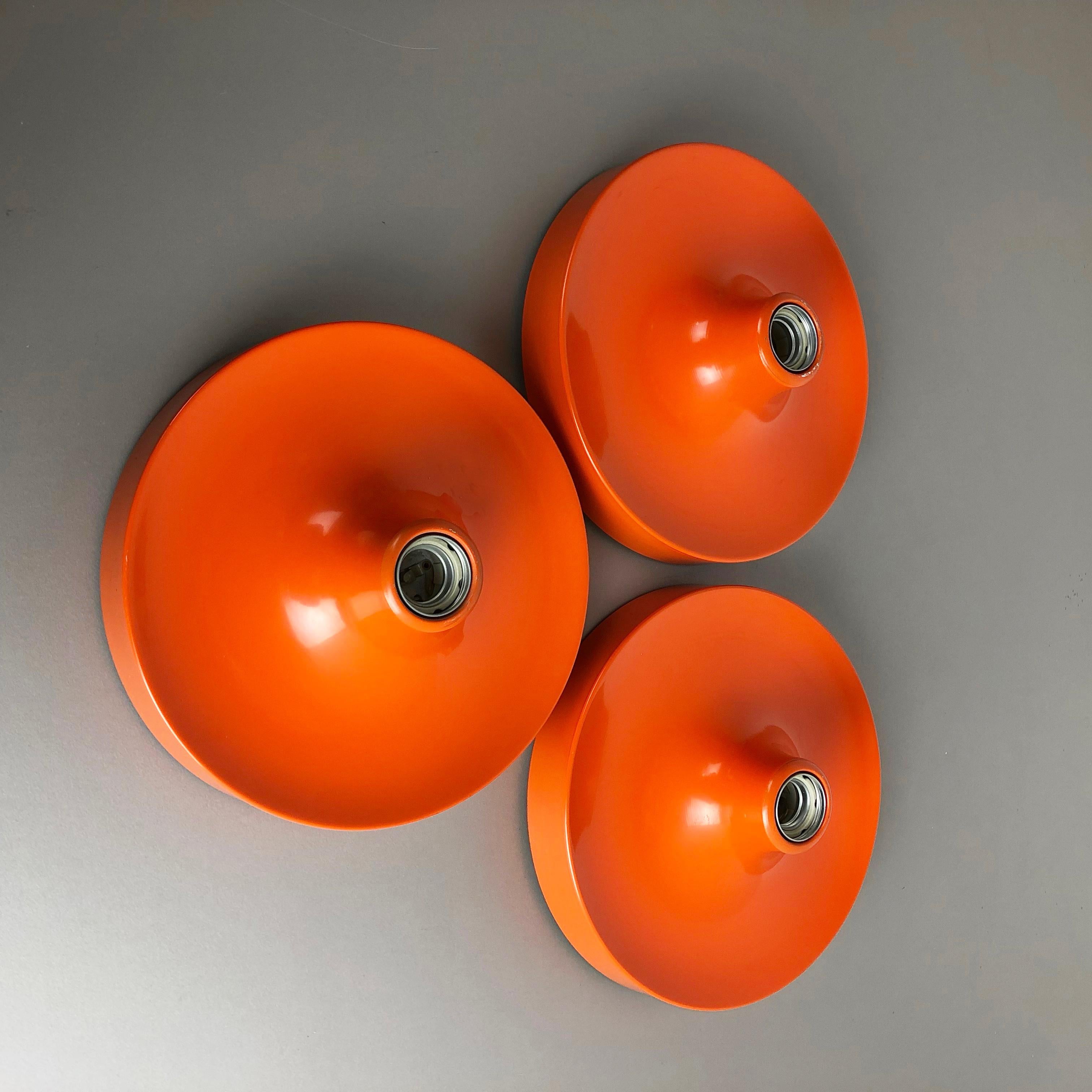 Mid-Century Modern Set of Three Orange 1960s Charlotte Perriand Disc Wall Light by Honsel, Germany