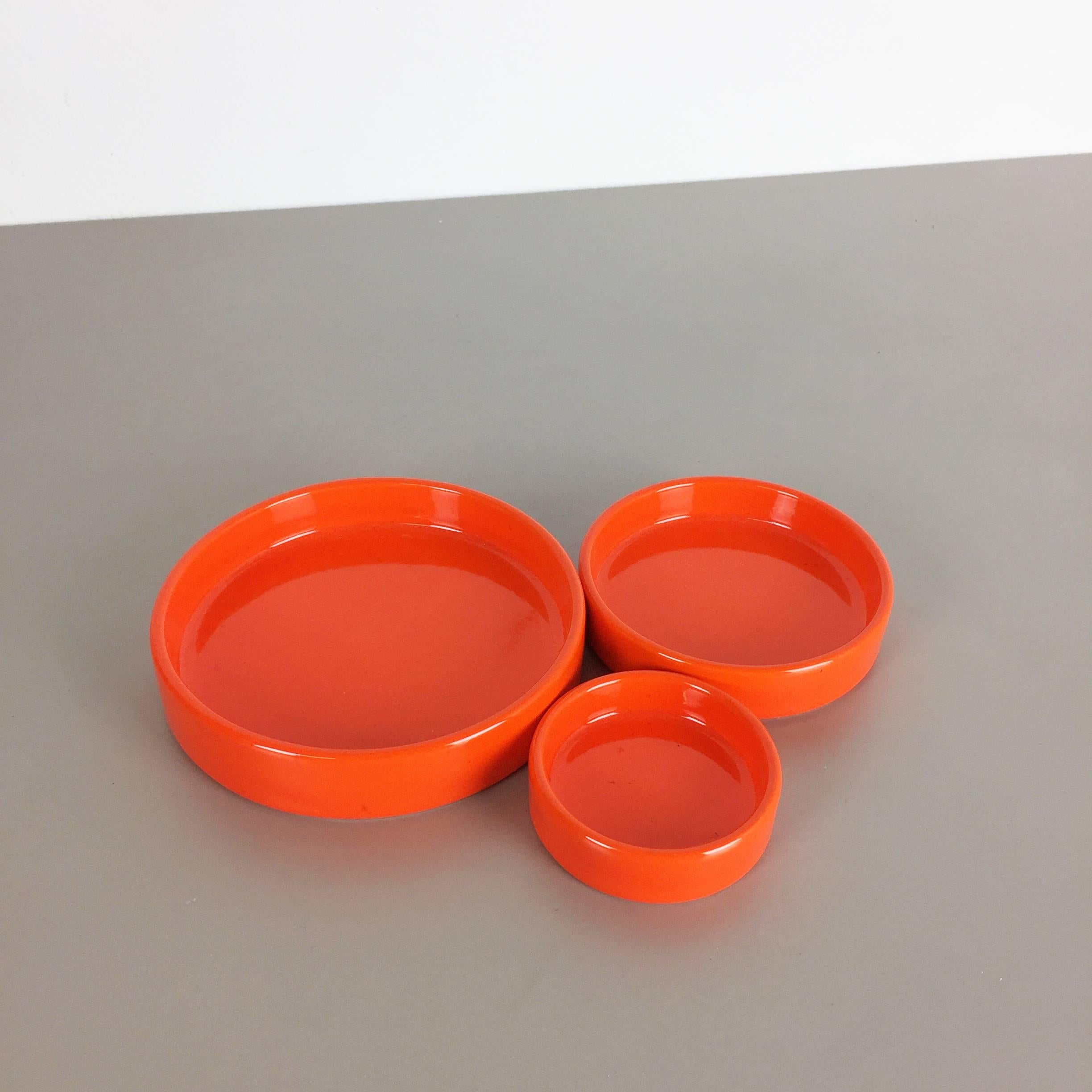 Mid-Century Modern Set of Three Orange Glazed Ceramic Bowls by Pino Spagnolo for Sicart, Italy