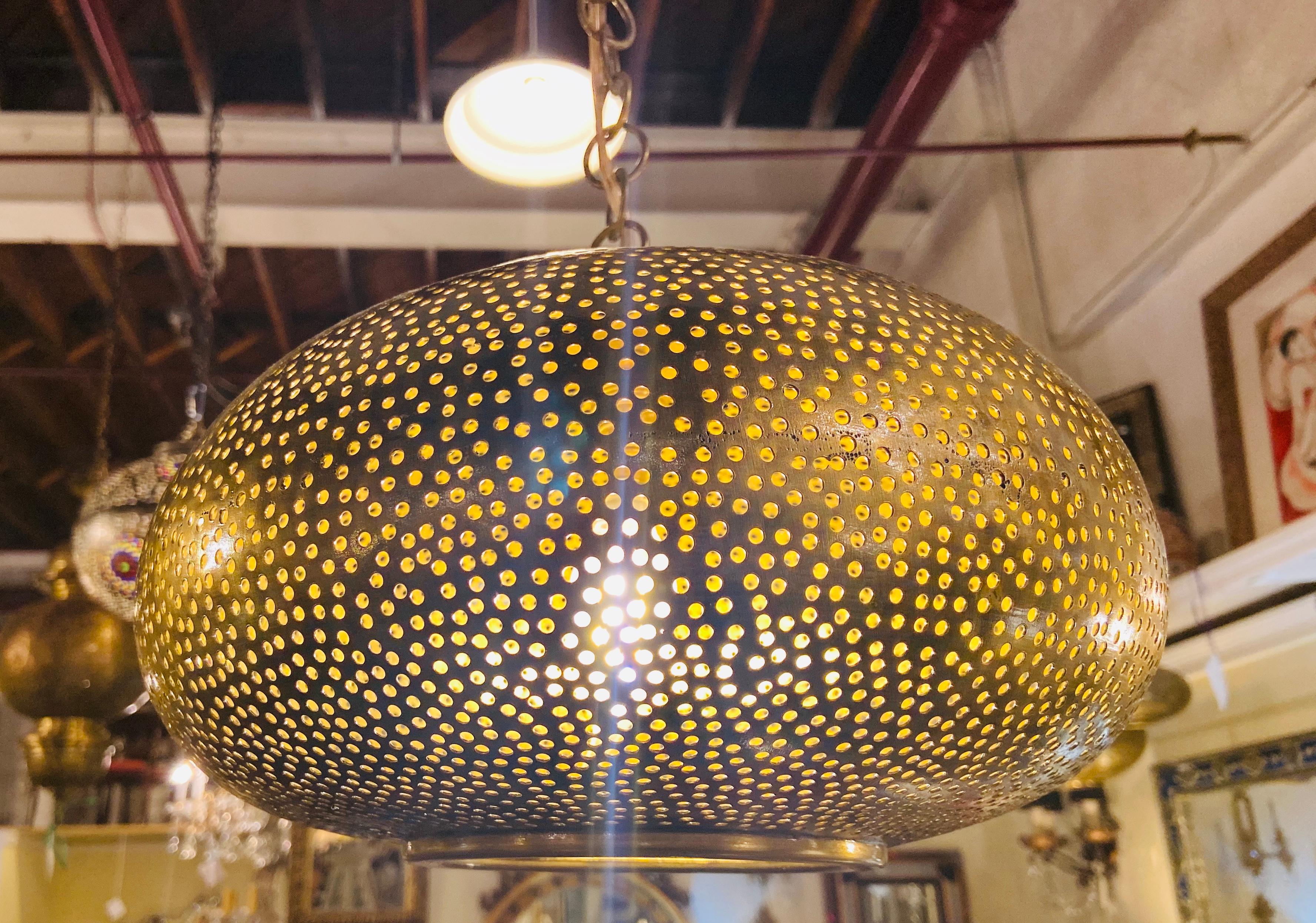 Set of Three Oval Shaped Brass Pendant Chandeliers in Graduating Sizes 4