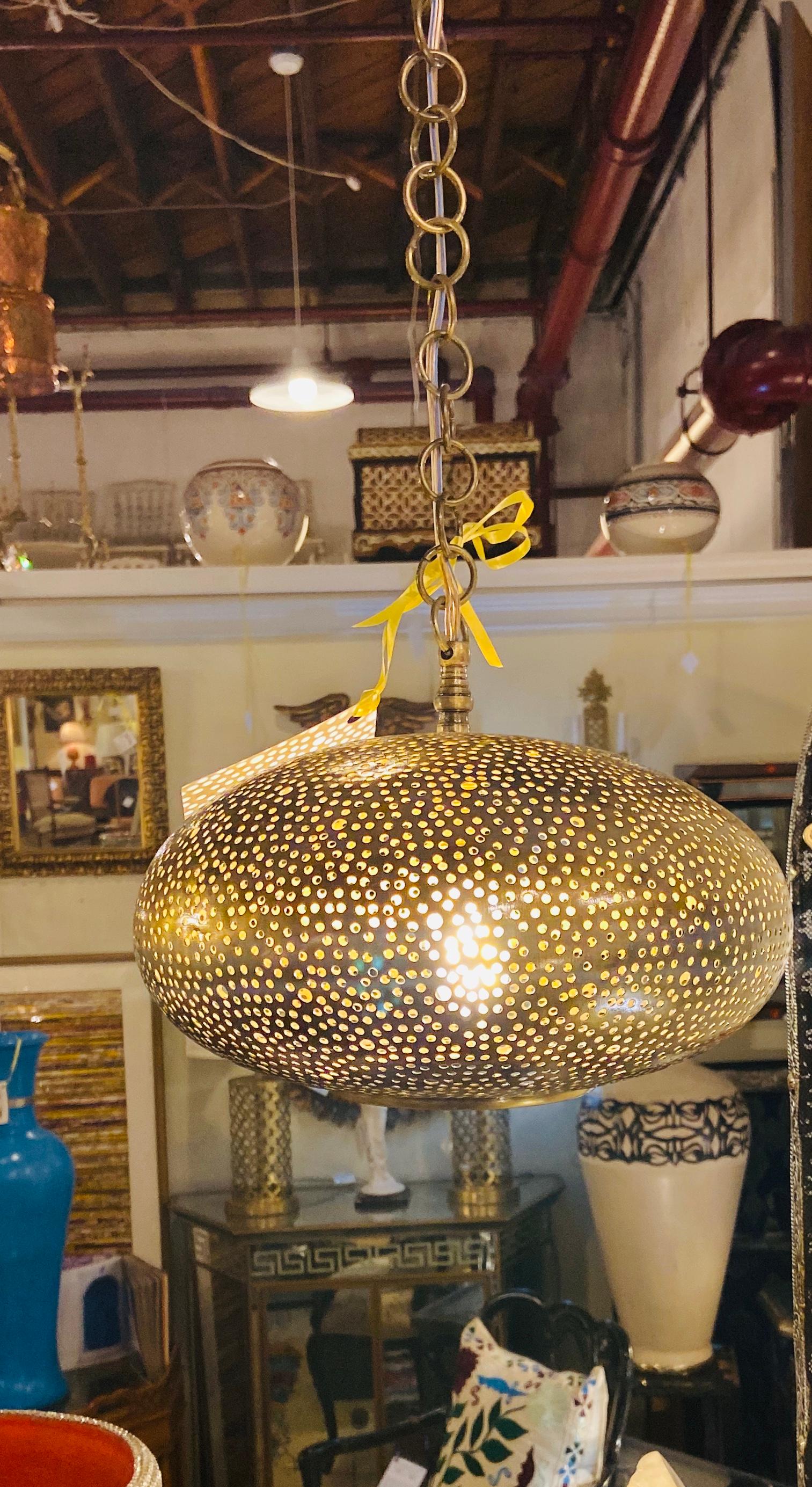 Set of Three Oval Shaped Brass Pendant Chandeliers in Graduating Sizes 1