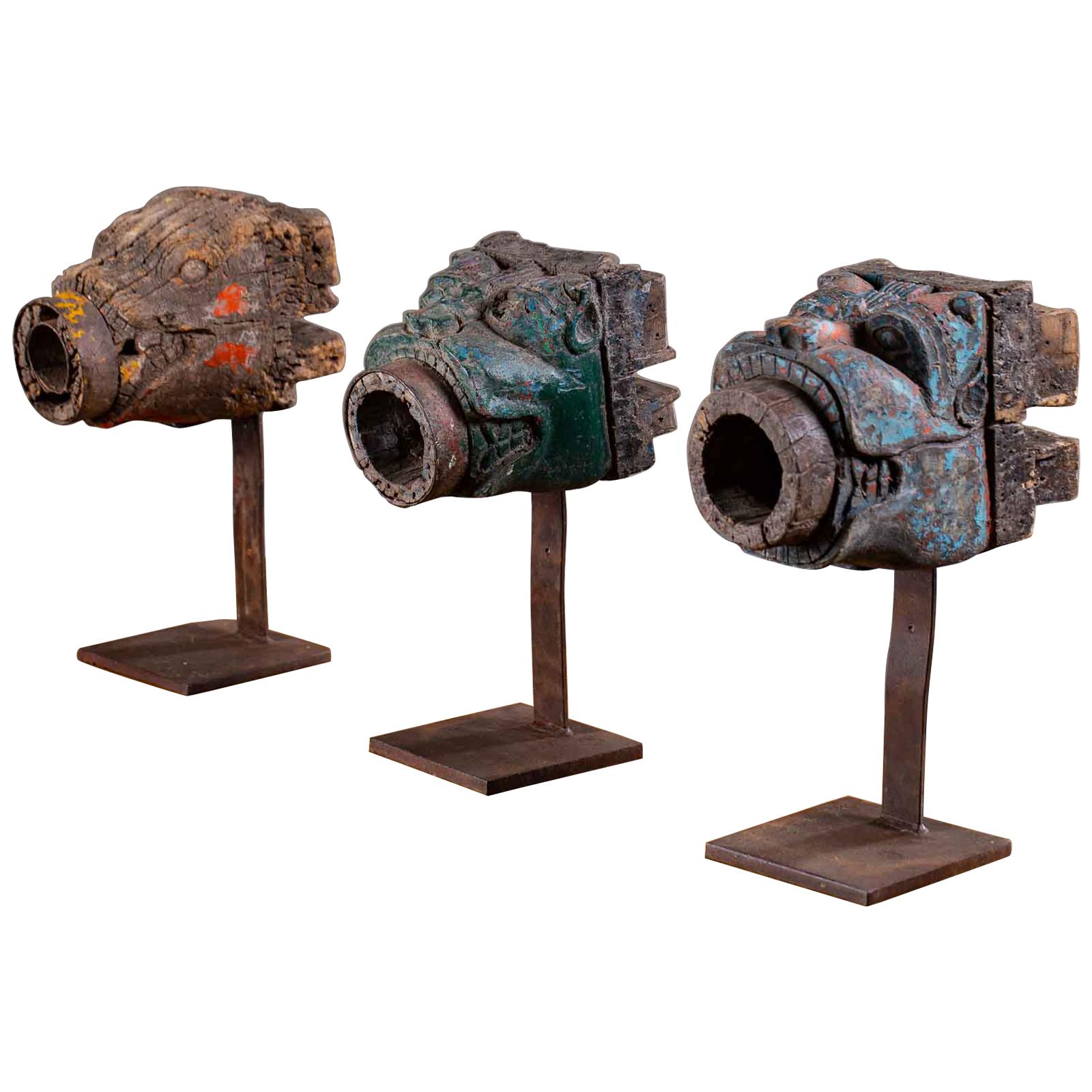 Set of Three Painted Carved Animal Head Sculptures on Stands from Indonesia