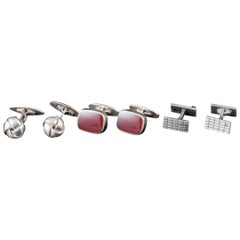 Ensemble de trois paires de boutons de manchette en argent. A.I.C..