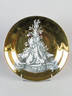 Set of three “Panoplie” series plates in porcelain with lithographed decoration