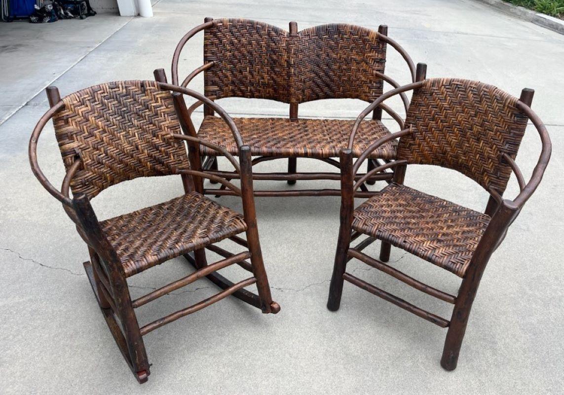 This amazing Old Hickory Furniture Settee & matching rocking chair & side chair is in fine condition with an amazing undisturbed surface. This set is signed by The Old Hickory Furniture Company in Martinsville, Indiana. The surface is the very best