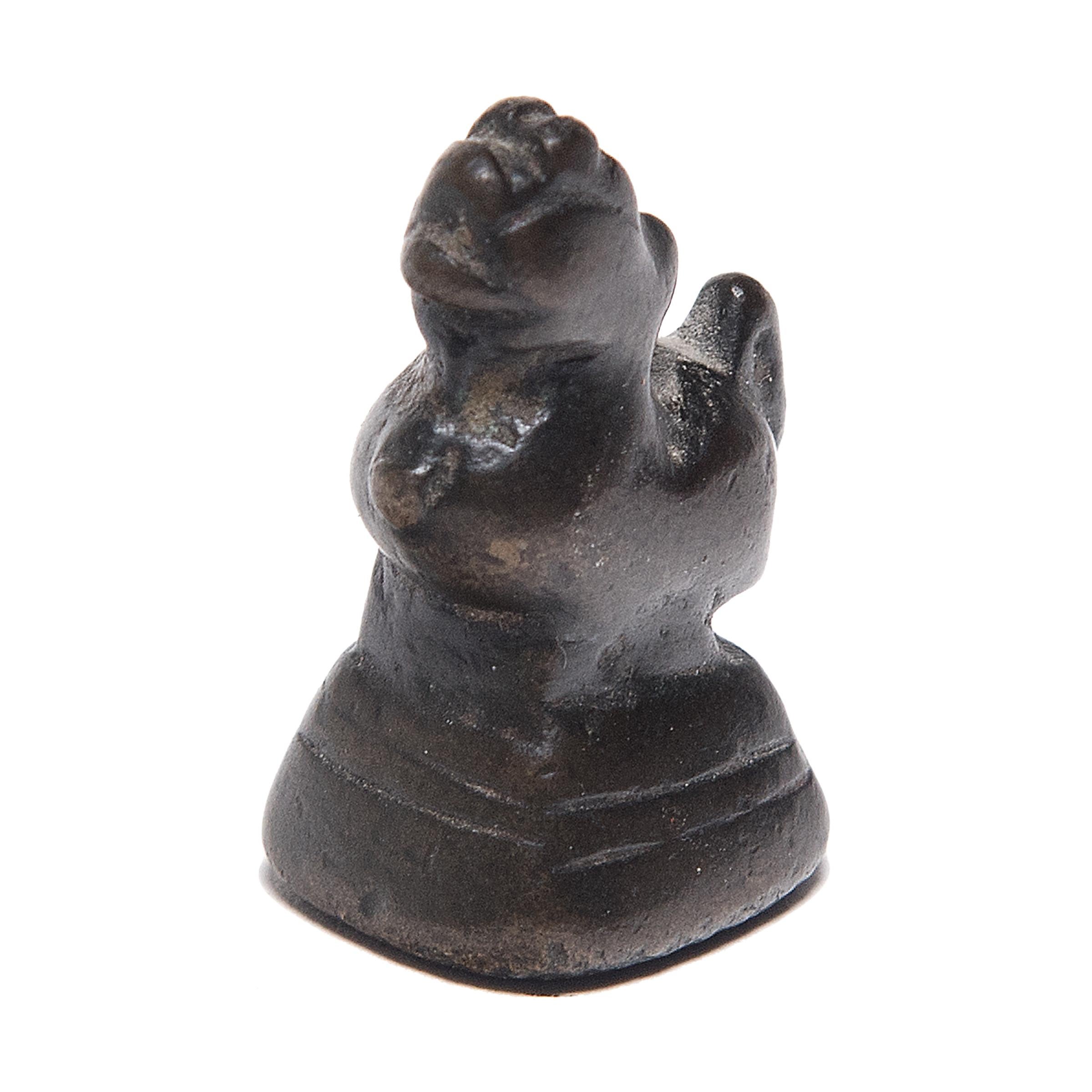 Whether used to parcel out opium, spices, or other valuable goods, these small figurines were originally used as counterweights for a tabletop balance. The petite weights are cast in bronze in the form of animals - two as roosters and one as a