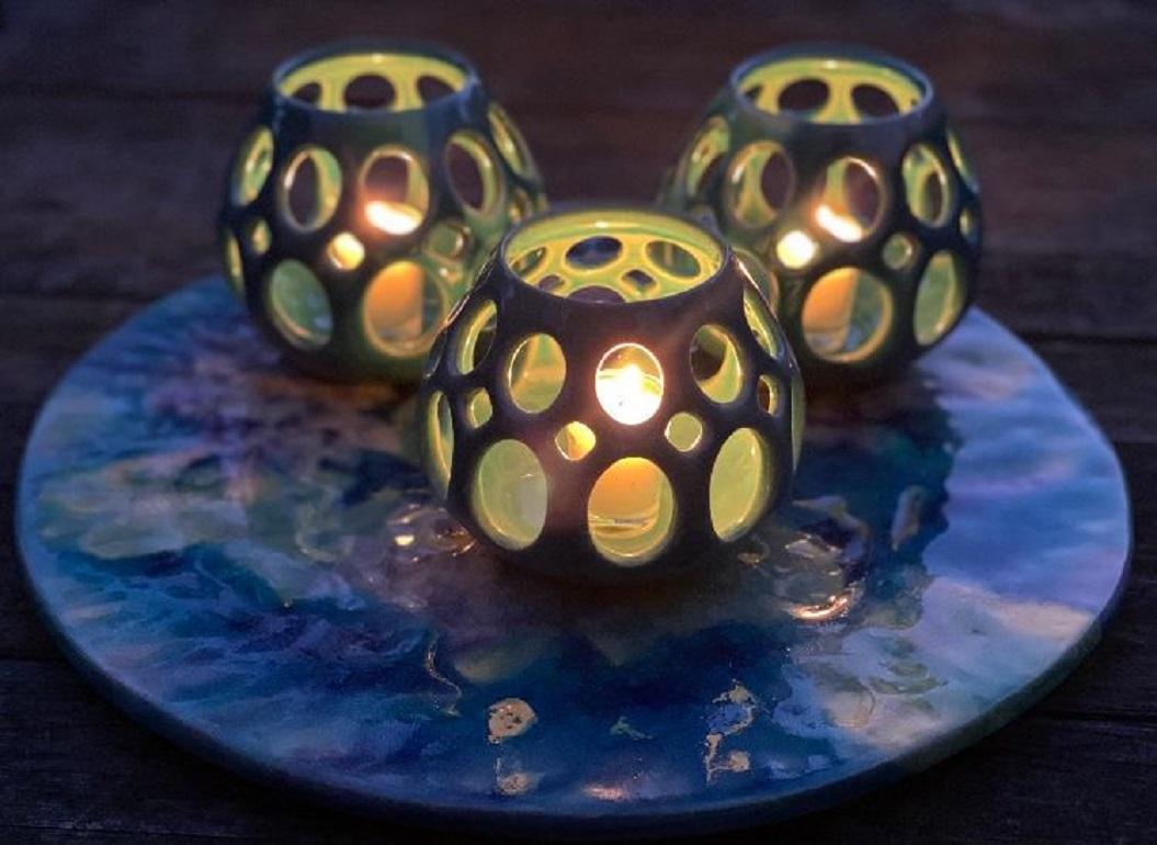 Fired Set of Three Pierced Turquoise Ceramic Tealight Candle Holders For Sale