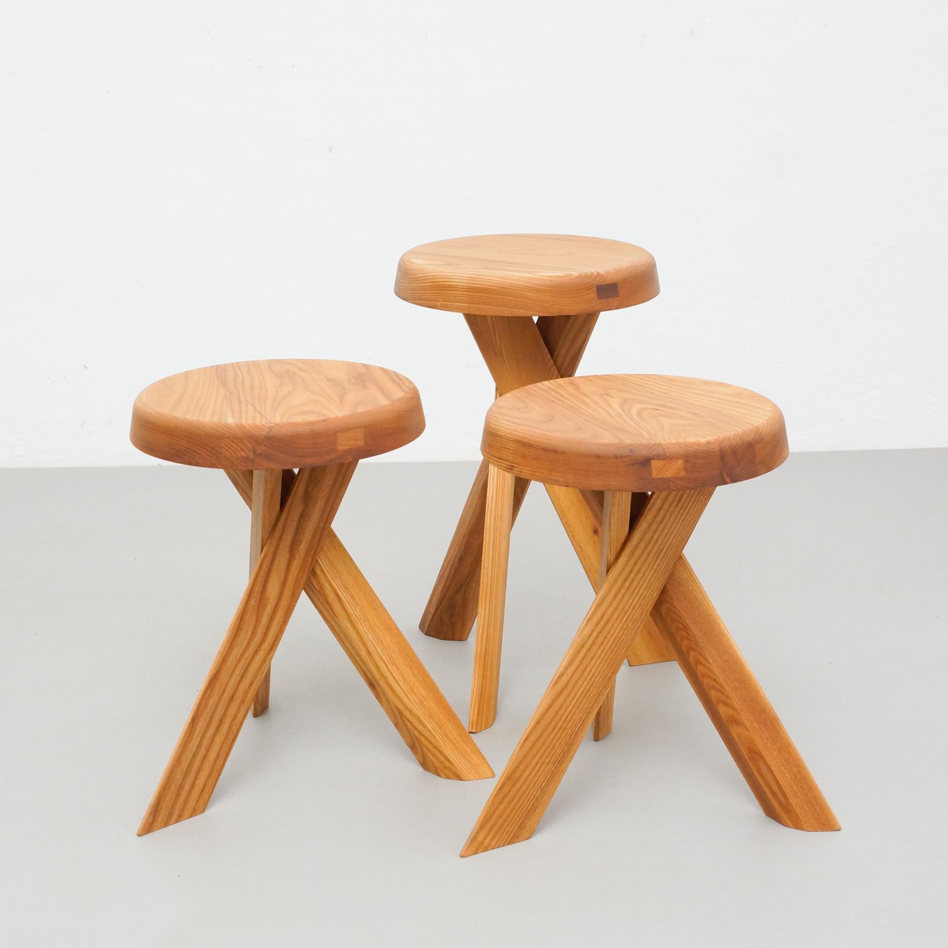 S31A and S31B stools designed by Pierre Chapo, circa 1960.
Manufactured by Chapo Creation in France, 2020.
Solid elmwood.

Measures: 33 cm x 45 cm / 33 cm x 55 cm 

In good original condition, with minor wear consistent with age and use,
