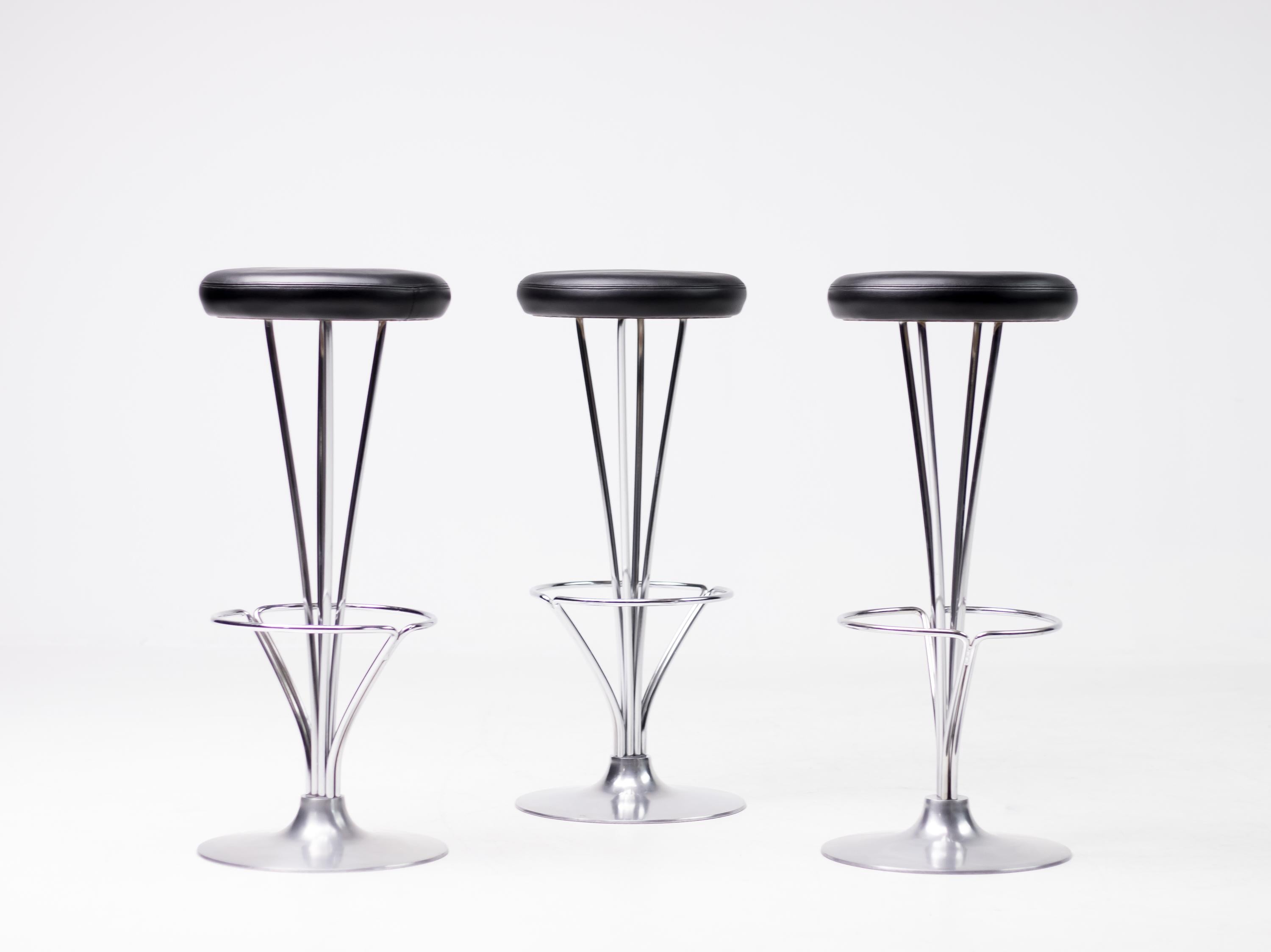 These elegant bar stools where designed by Piet Hein for Fritz Hansen, Denmark.
They are in great original condition with black leather seats.
Marked with Fritz Hansen label at the bottom of the seat.
Priced as a set.