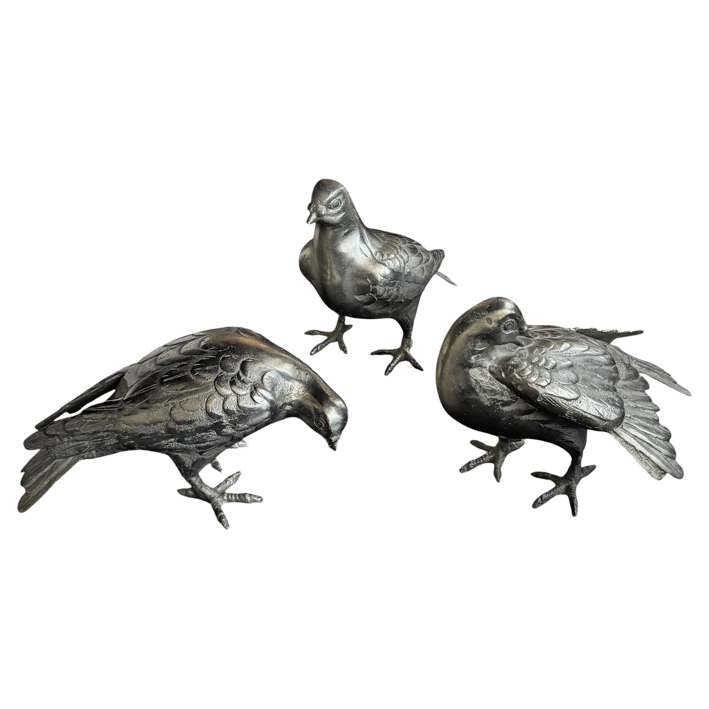 Set von drei Schweinenskulpturen