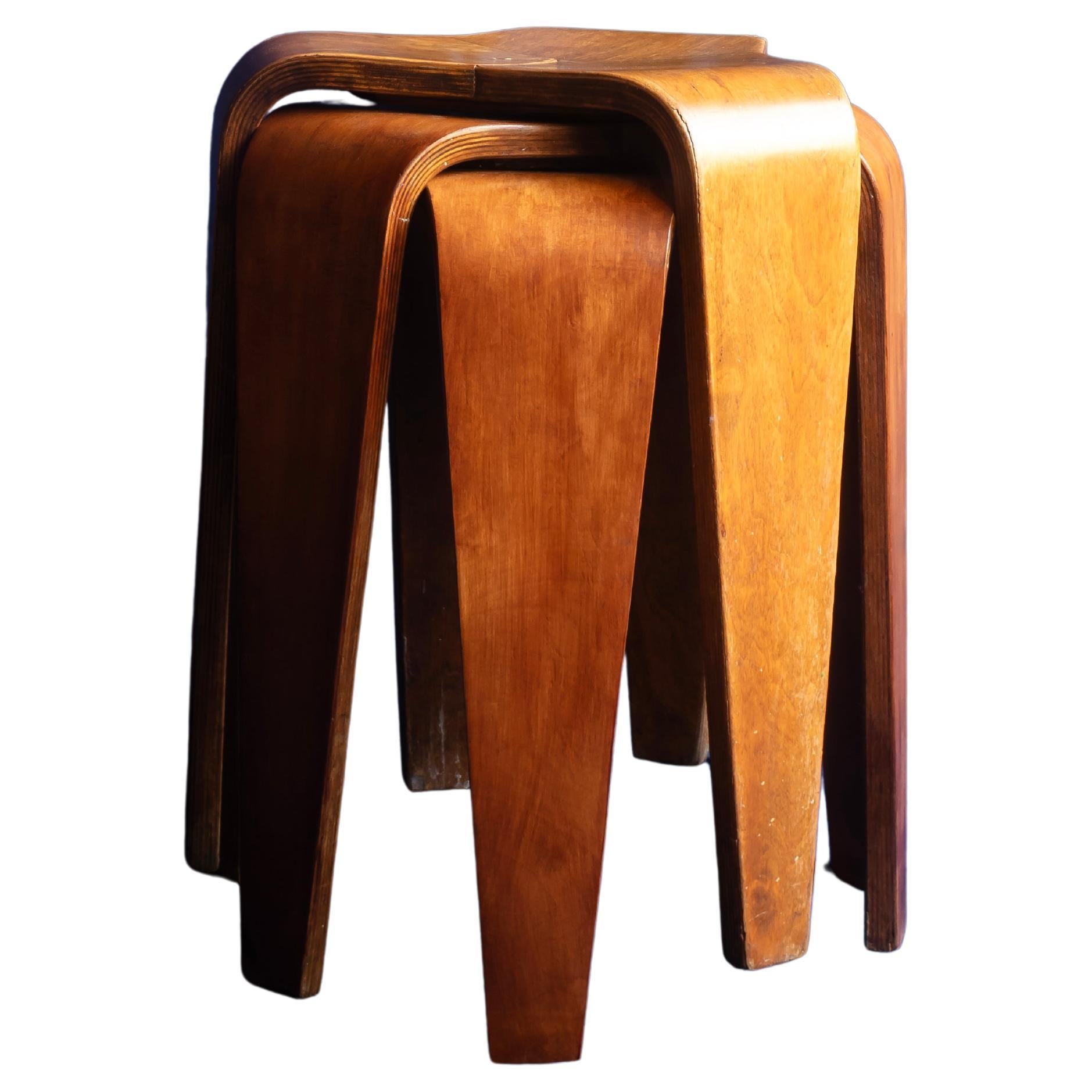 Set of three plywood stacking stools by Marcel Peclard for Horgen Glarus. 1960s  For Sale