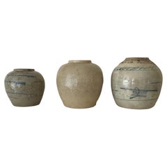 Set of three provincial glazed pottery ginger jars