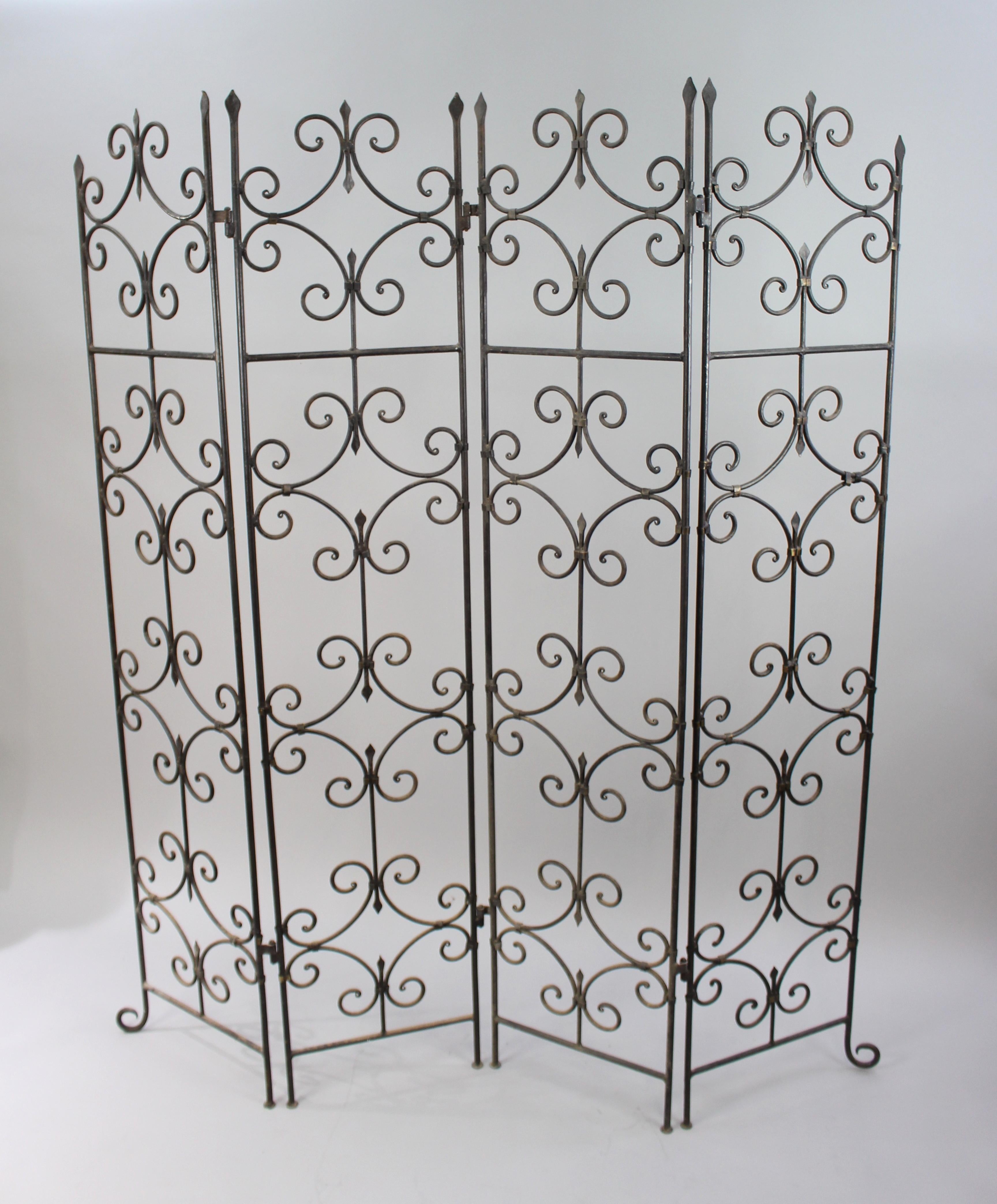 Measurements: 

Width of each panel 
40 cm 15 3/4 in

Height 
182 cm 71 in

Four fold screen

Composition 
wrought iron, very heavy

Condition 
very good condition commensurate with age (damage to hinge on one screen)


Three lovely quality heavy