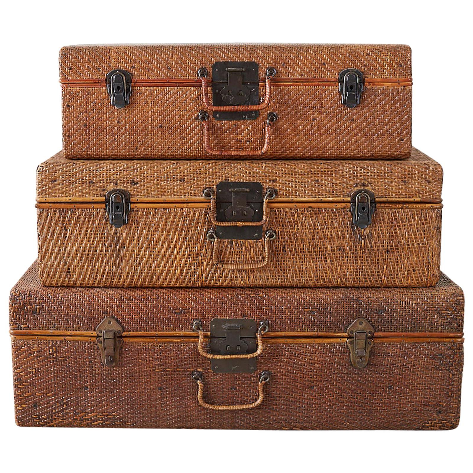 Set of Three Rattan Raffia Clad Wooden Suitcases