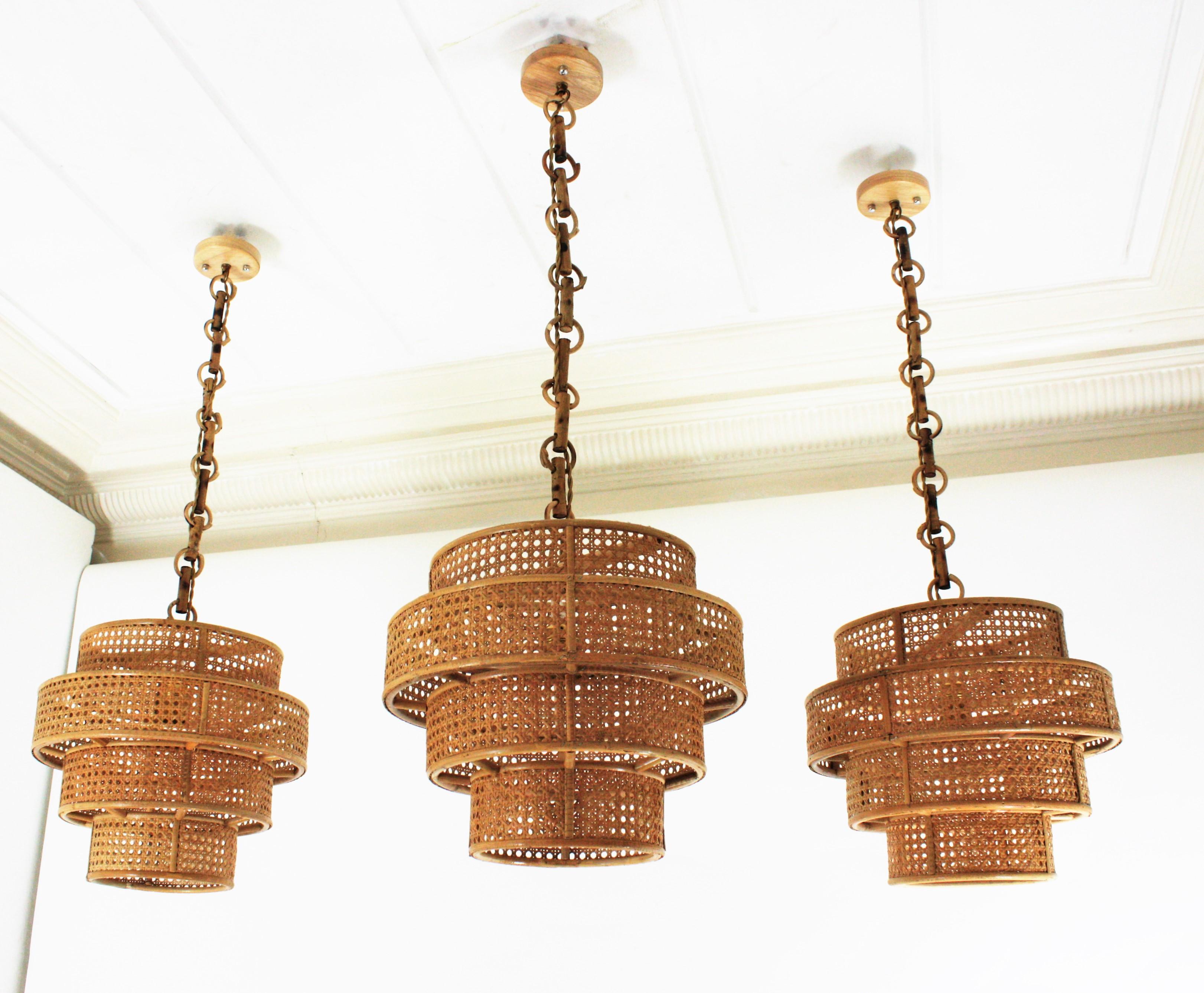 Set of Three Rattan Wicker Weave Cylinder Pendant Lights / Lanterns In Good Condition For Sale In Barcelona, ES