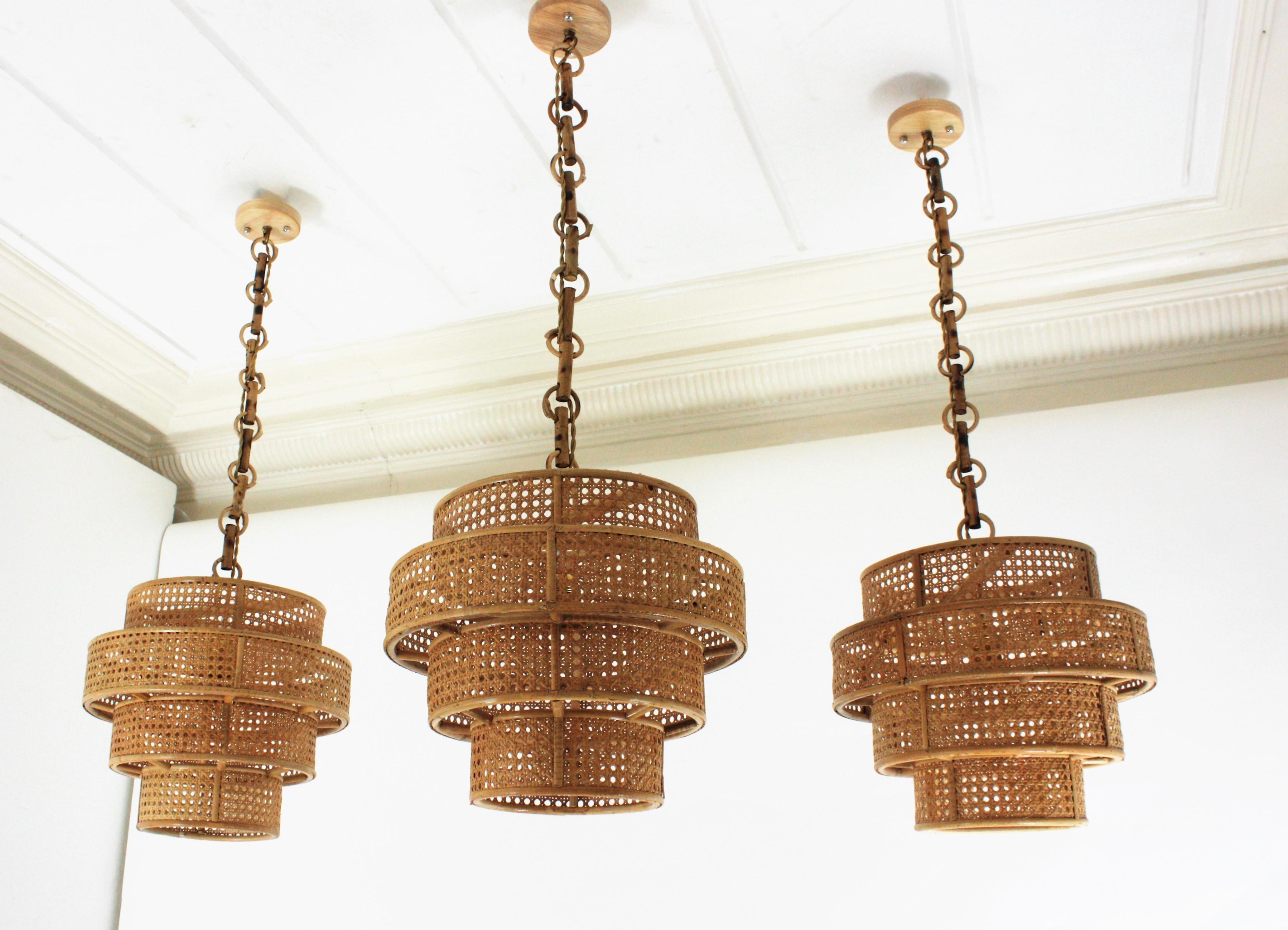 20th Century Set of Three Rattan Wicker Weave Cylinder Pendant Lights / Lanterns For Sale